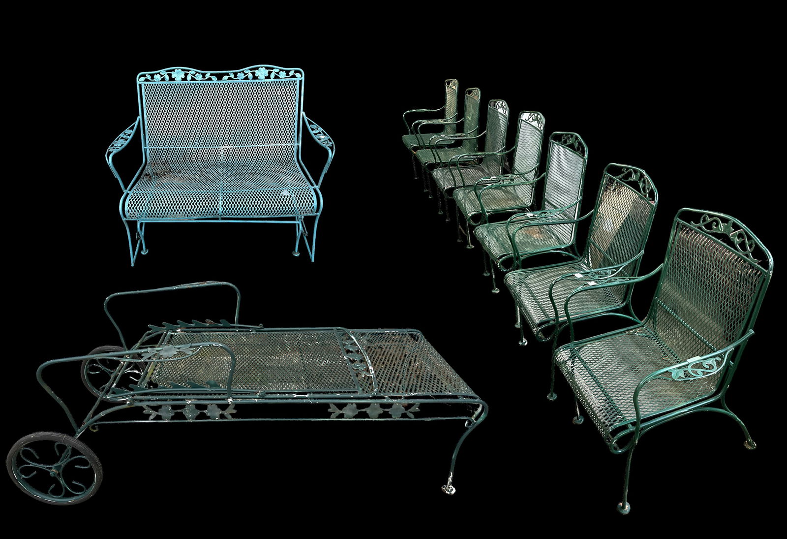 Lot of Wrought Iron Patio Furniture.: This set includes seven matching wrought iron armchairs, a glider, and a chaise lounge. The set shows signs of being outdoors, but is in good overall condition. The chairs each measure 24" wide, 18" d