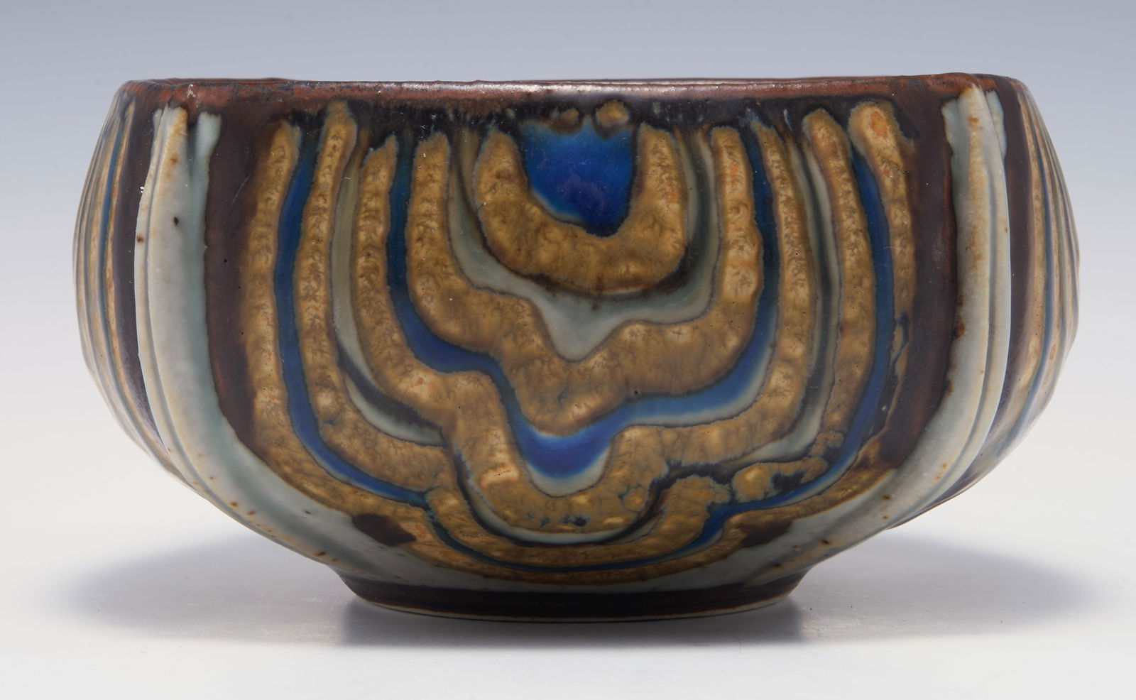 Royal Copenhagen Stoneware Bowl - Ivan Weiss.: This piece, circa 1970, is stamped by Royal Copenhagen, and hand signed pre firing by Ivan Weiss. It measures 2 1/2" tall, and 4 1/2" wide. The piece displays no damage, other than sticker residue on