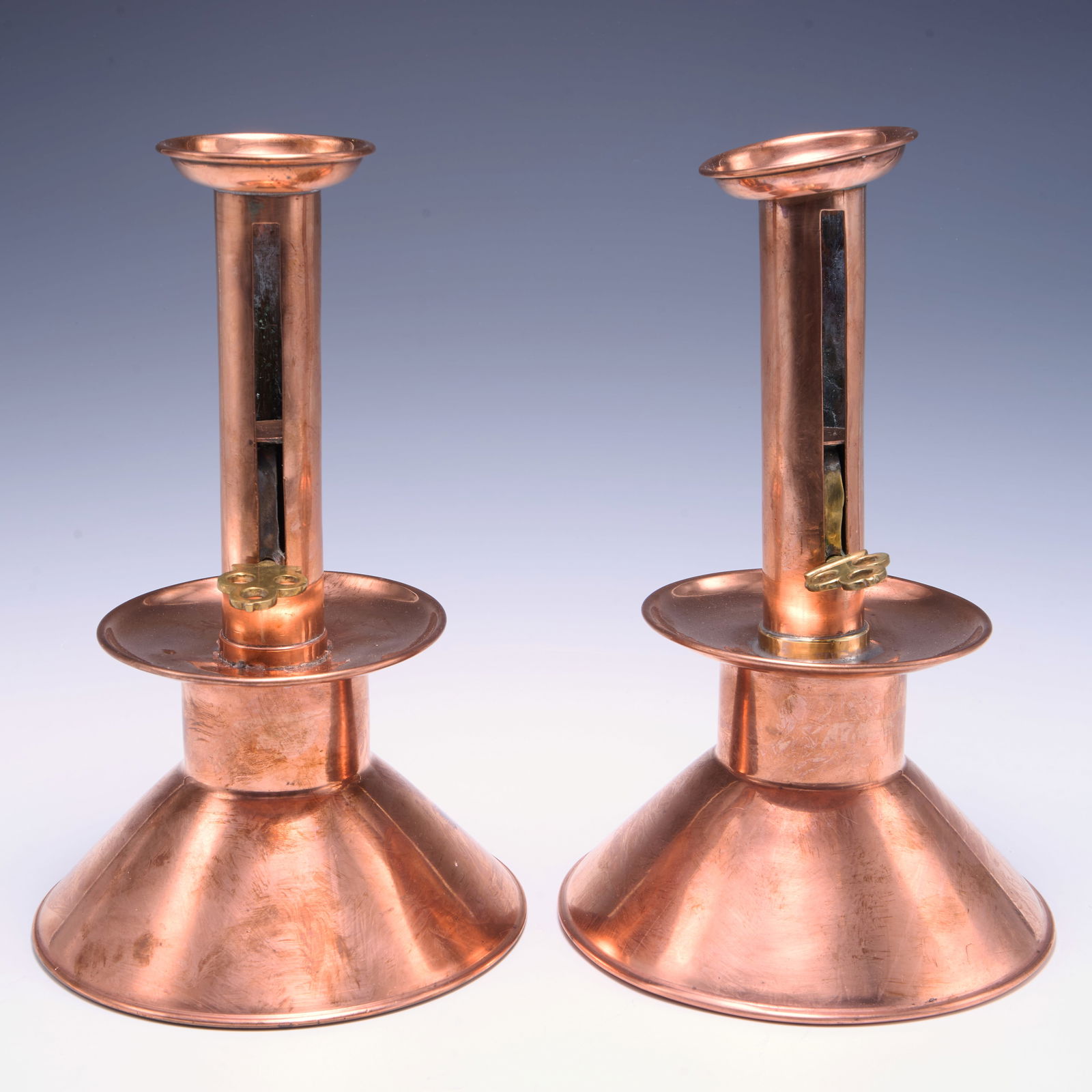 Pair of Antique Adjustable Copper Candleholders. (1 of 2)