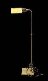 1980's Modern Koch & Lowy Style Floor Lamp.: This brass-finished bridge lamp can have its height adjusted, as well as the angle of its shade. It is currently working, and in good condition, with only minor scratches. It was manufactured in 1986,