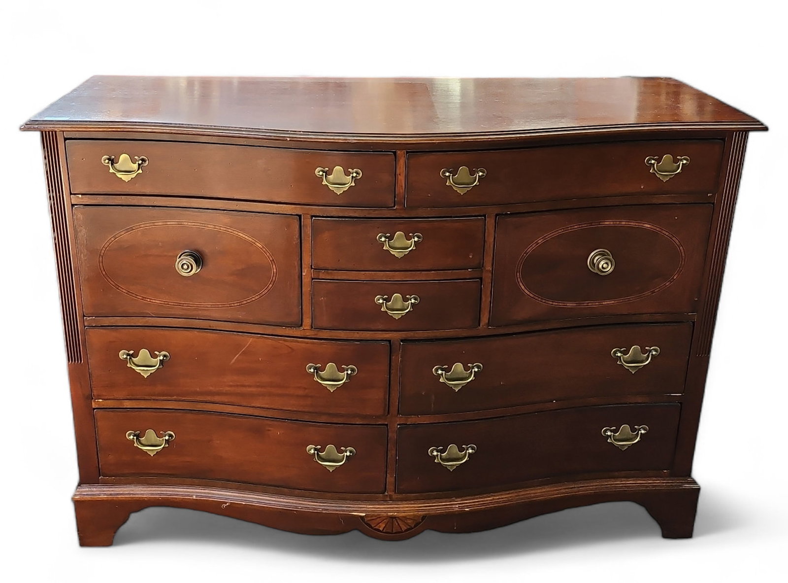Palmer Home Collection Dresser.: This mahogany dresser, buffet, or sideboard is by the Palmer Home Collection - Lexington Furniture Industries. It has a bow front with a banded and inlaid design, and ten drawers. The handles and pull