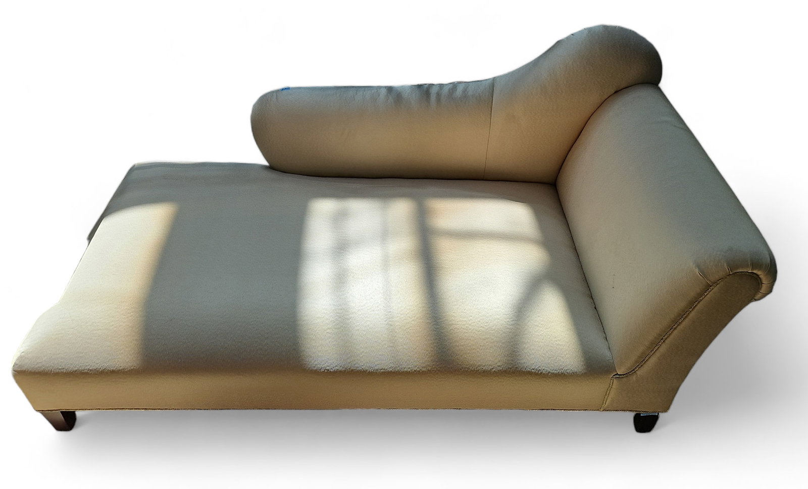 Chaise Lounge.: This chaise lounge has a light colored satin-like upholstery. There is a water stain and some dirt marks on the upholstery, but overall, it is in good condition. It measures 68" wide, 35" deep, and 33