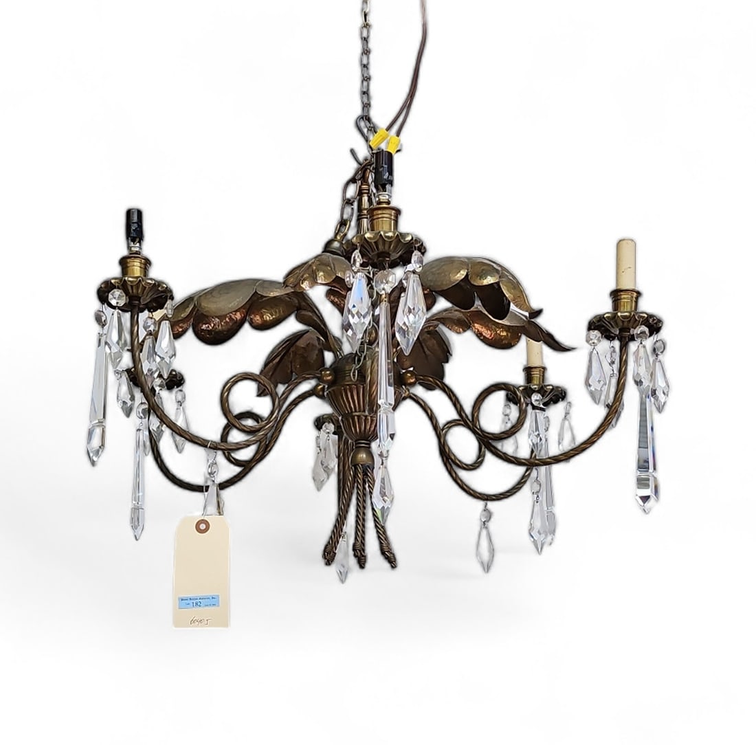 Lg. Copper Colored Metal Chandelier w/ Leaf Design: The Light Fixture is quite ornate, and has dangling crystal prisms. It is untested. The Fixture measures 26" across, and 18" long. Third-party shipping or personal pickup is required. Please see our w