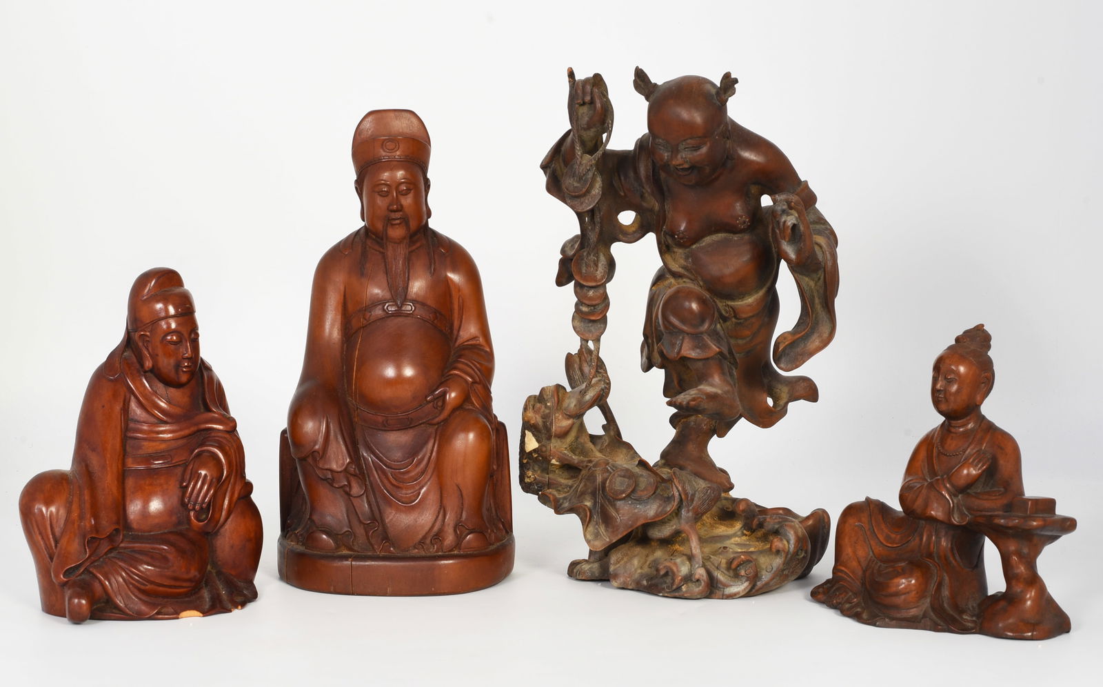 Lot of 4 Carved Chinese Wood Figurines. (1 of 4)