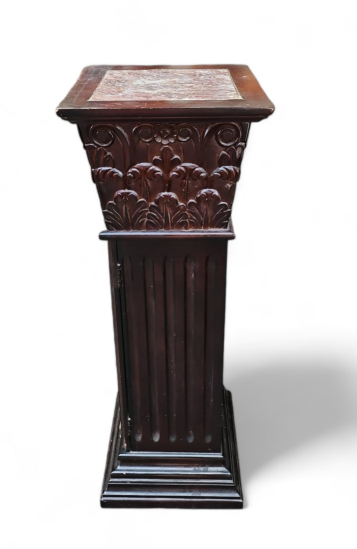 Marble Top Pedestal.: This carved wood marble top pedestal has one door and an adjustable inner shelf. It has some scratches and indentations, but it is in otherwise good condition. It measures 36" tall, 12 1/2" wide, and 