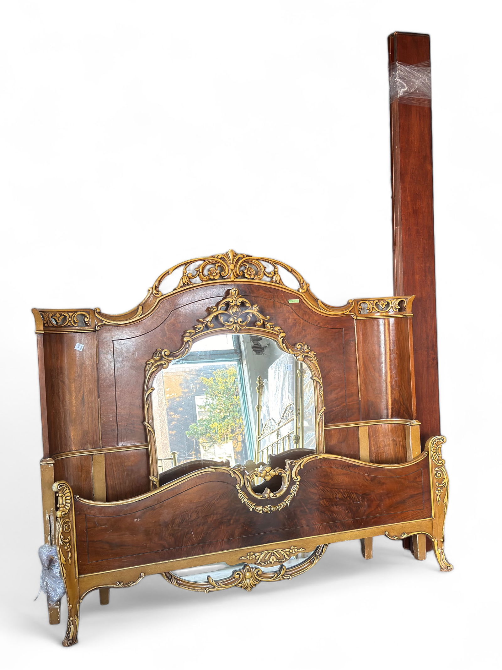 Vintage French Carved Bed & Mirror.: The bed has a bit of wear and scratches, but overall, both pieces are in good overall condition for their age. The bed comes with side rails. The bed measures 51 1/4" tall and 55 3/4" wide. The mirror