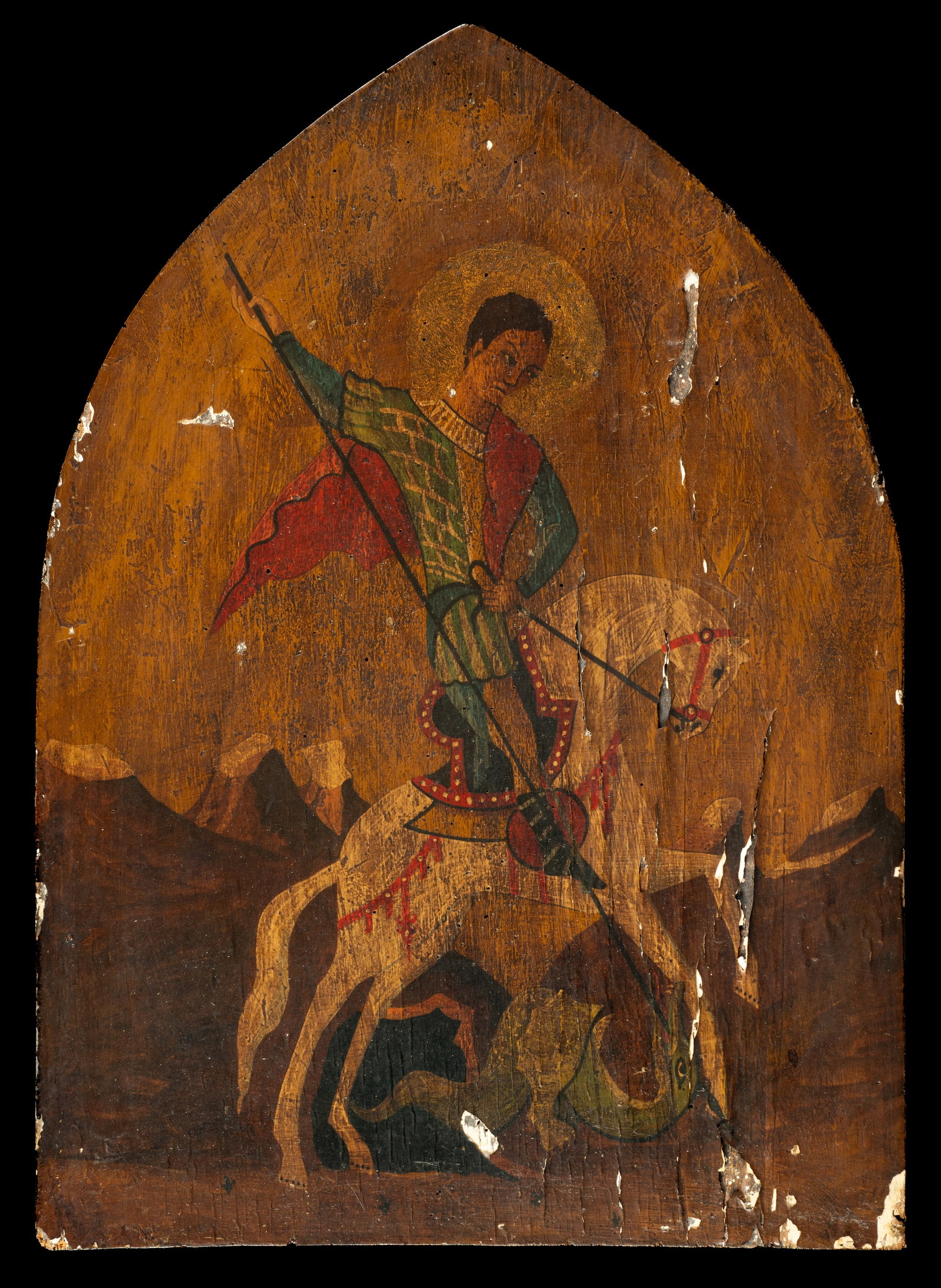 Antique Icon of St. George and the Dragon.: This painting on panel is unsigned. The arched panel has wormholes, and the paint is peeling in several areas. The work measures 22" x 16". In-house shipping is available. Please see our website regar