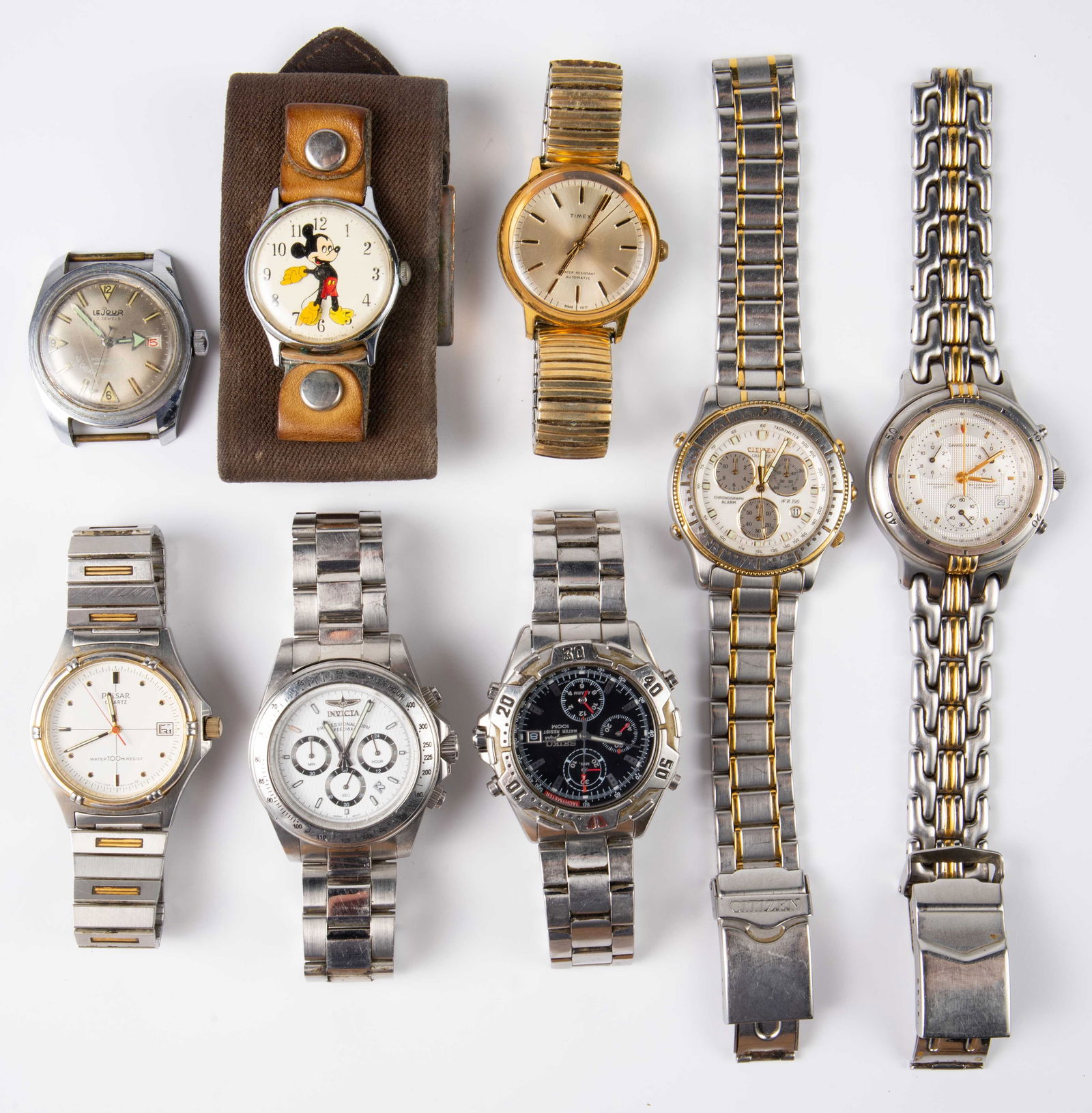 Lot: 8 Mens' Wristwatches - Citizen, Invicta, Etc.: The lot includes 8 wristwatches from the following brands: Seiko, Pulsar, Daniel Mink, Invicta, Citizen, Timex, Le Jour, and Walt Disney Productions Mickey Mouse. The smallest watch case measures 31mm
