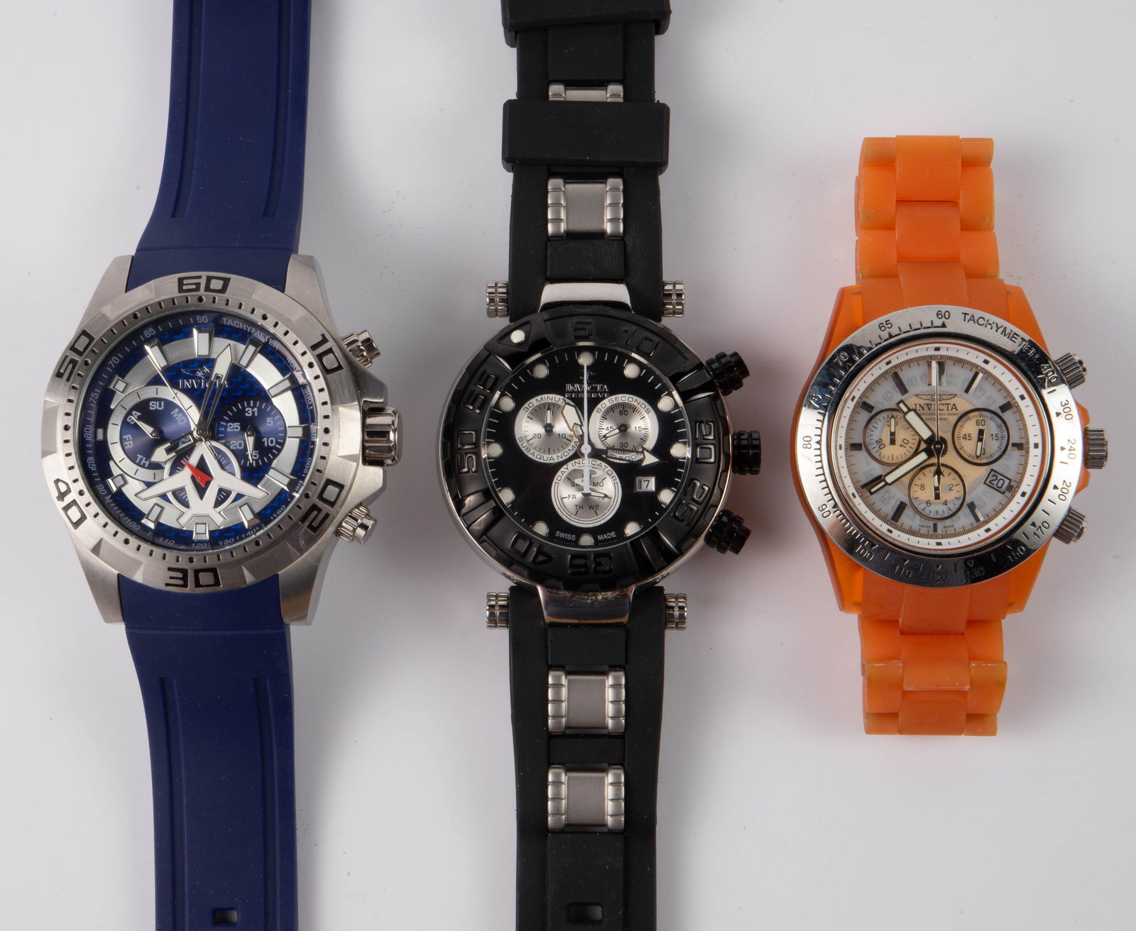 Lot of 3 Invicta Mens' Wristwatches.: The lot consists of 3 watches. First, there is a black limited edition Noma I. It is Model number 20468. It is a chronograph, with the watch case measuring 45mm in diameter. The knob does not turn, no