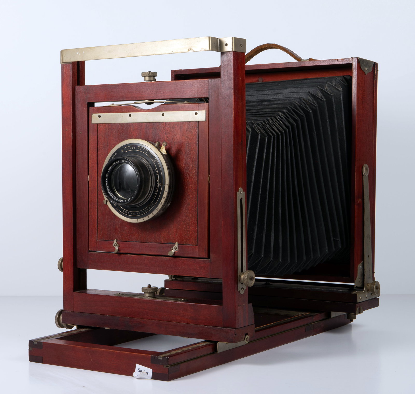 Gundlach 8x10 Camera with Turner-Reich f/7 Lens.: The camera appears to be in good condition for its age. All movements seem to work properly, and the bellows look structurally sound, with no obvious cracks or tears. The focusing screen is in good sh