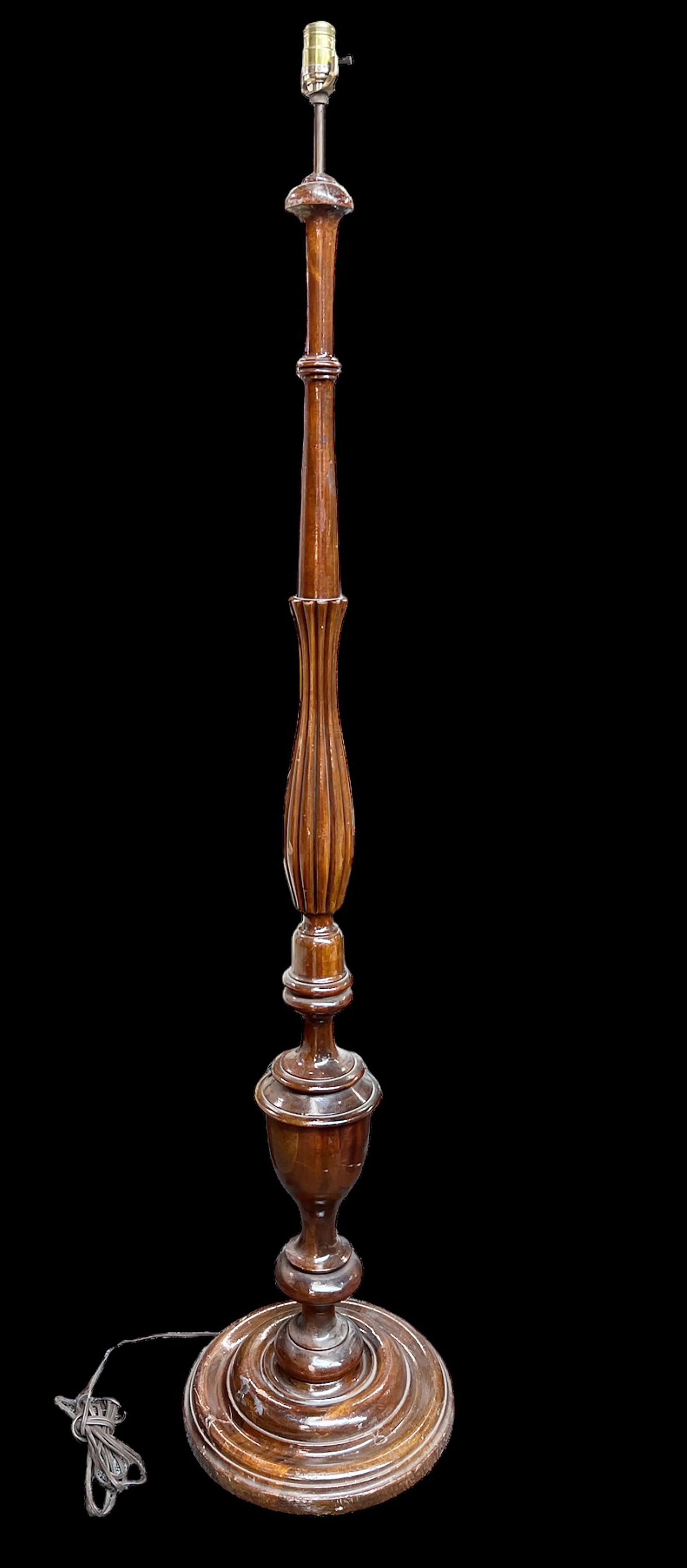 Mahogany Carved Wood Floor Lamp.: This wood floor lamp is missing its lamp shade and harp. There are some scuff marks, but overall, it is in good condition. It is untested. It measures 66" tall and 14" diameter. Third-party freight sh