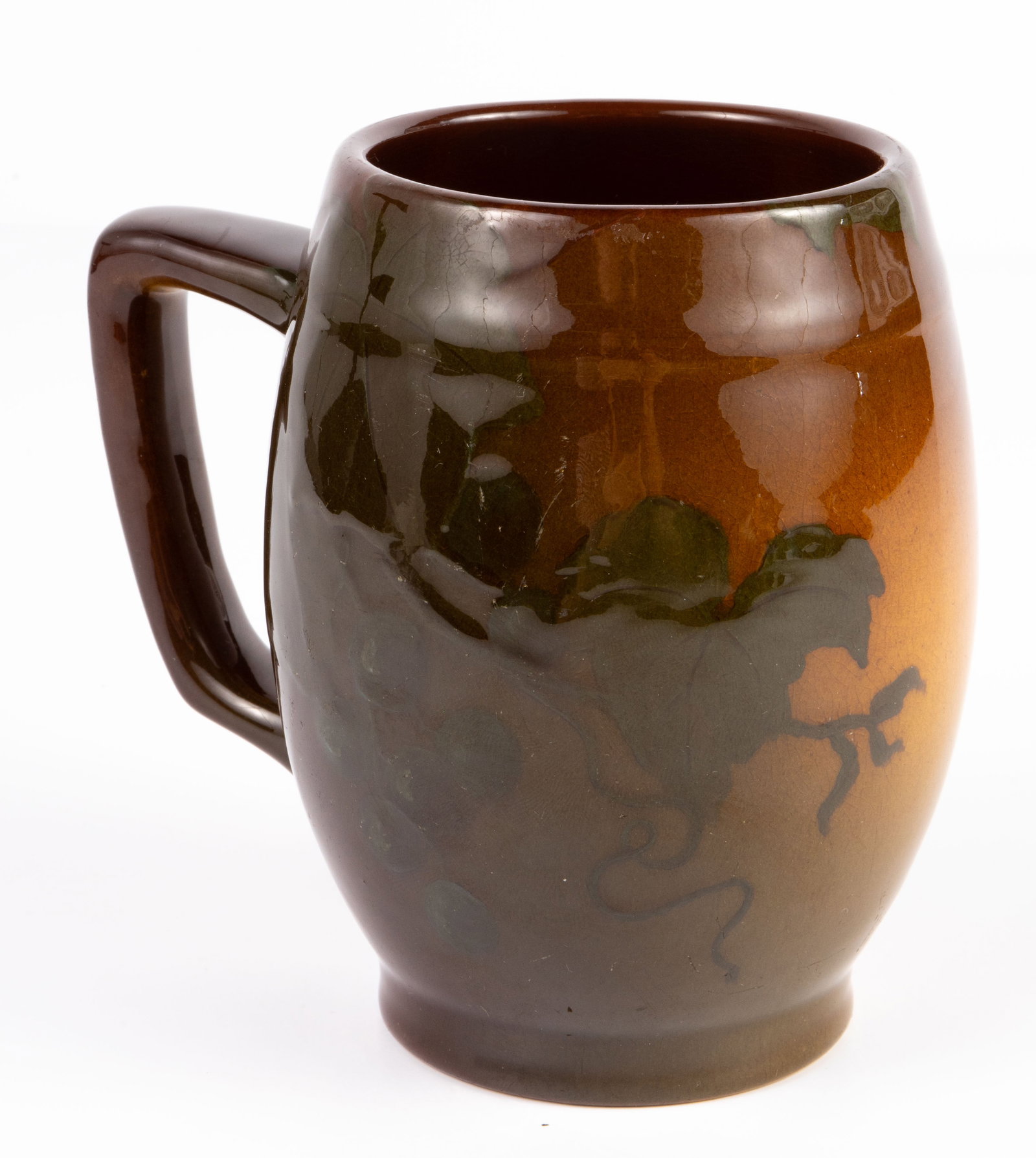 Rookwood Pottery Mug, Artist Signed Marian Smalley: The underside bears the Rookwood Pottery flame stamp, and is dated 1899. It is signed, "MHS" and numbered 645. "MHS" is the signature for Marian Frances Hastings Smalley. The mug has a painted image o