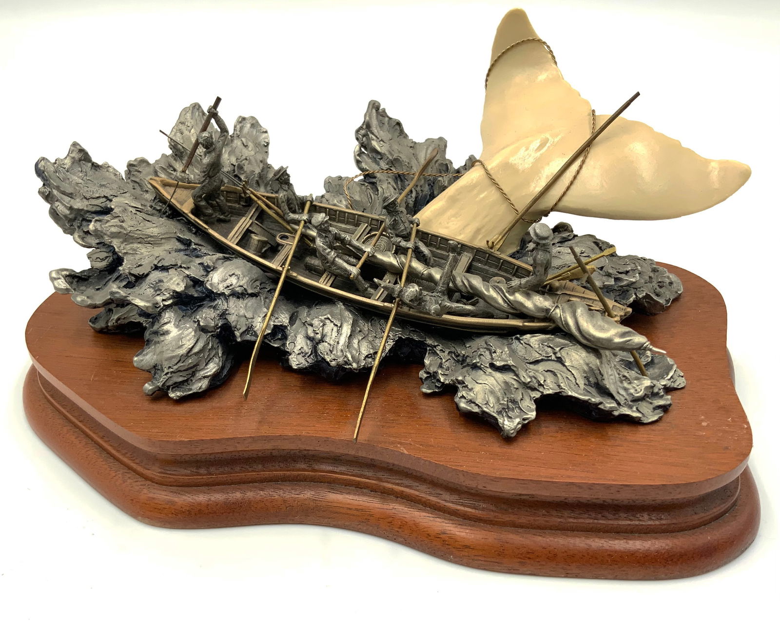 1985 Chilmark Pewter Sculpture, Moby Dick.: The piece is in good overall condition. The Sculpture, not including the Wood Base, Measures 8 1/4" Wide. In-house shipping is available. Please see our website regarding our in-house shipping procedu