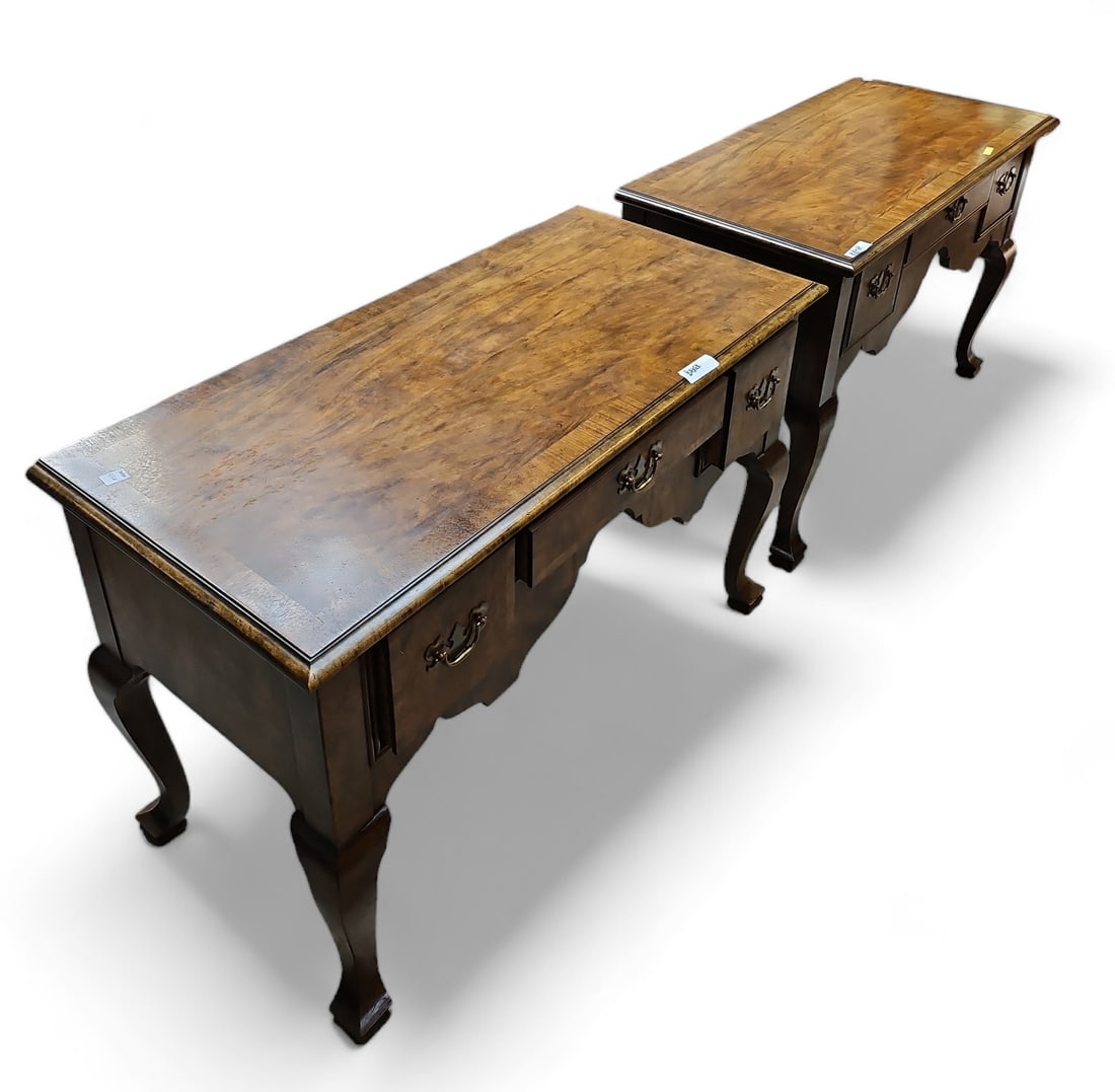 Pair of Baker Lowboy, Hall or Console Tables.: Both of these Baker tables (No. 1659) are signed. Each table has three drawers, brass hardware, and cabriole legs. Both are in excellent condition, with minimal wear. Each one measures 40" wide, 19" d