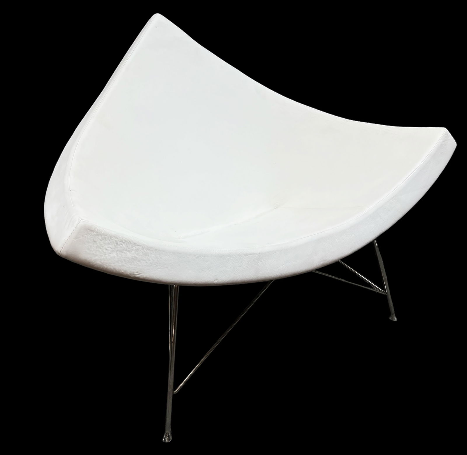 George Nelson Style Coconut Chair.: This lounge chair has white leather upholstery and chrome tubular legs. There are a few scratches and dirt spots, but overall the piece is in good condition. It measures 40" wide, 20" deep, and 32" ta