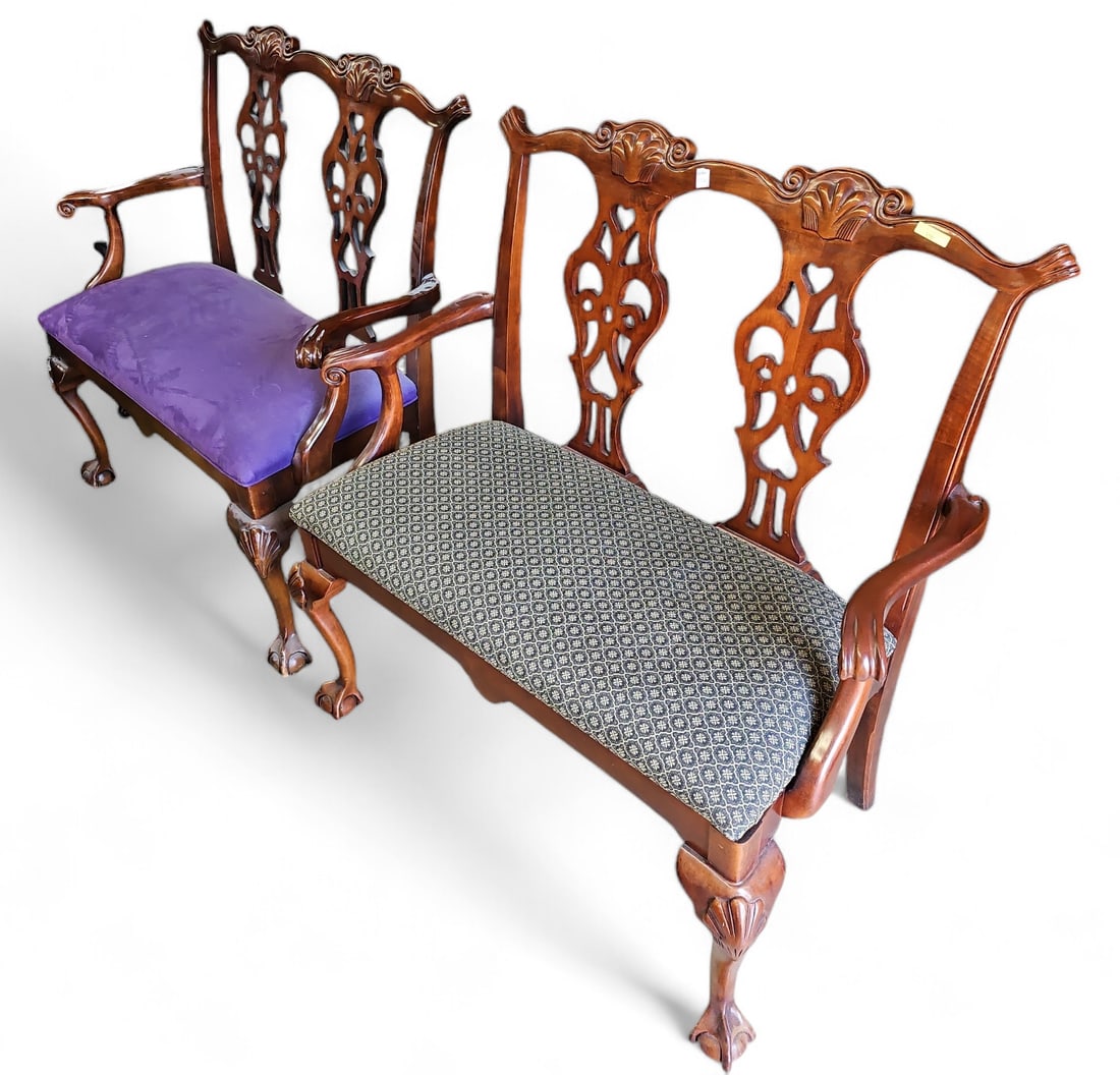 Matched Pair of Chippendale Style Settees.: These settees are matching, except for their upholstery. Each one features two pierced splats, ball and claw front feet, and shell designs on the front legs. Both are in good condition, with minimal w