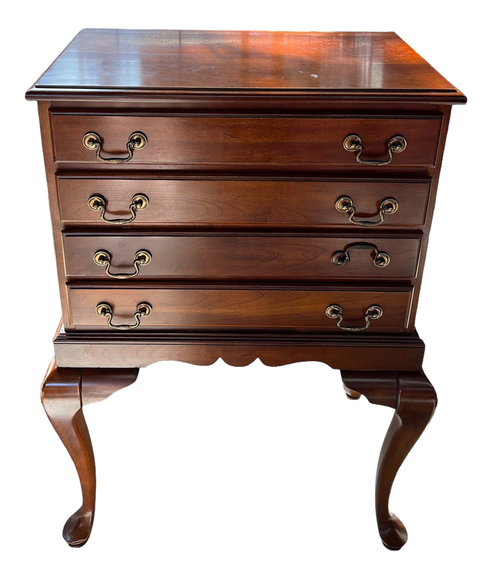 Queen Anne Mahogany Silverware Chest.: The chest has four drawers with divided sections and brass hardware. There are some small indentations on the top, but overall the piece is in good condition. It measures 23 1/2" wide, 14" deep, and 3
