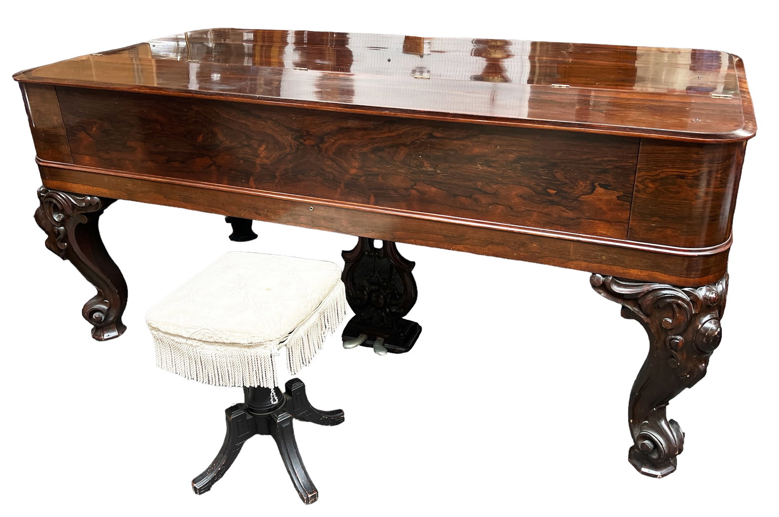 Early Steinway & Sons Rosewood Square Grand Piano.: The serial number of the piano is #2483, dating it to about the year 1858. The piano underwent full restoration in 2010, including restringing and refinishing. From the sound it currently produces, it