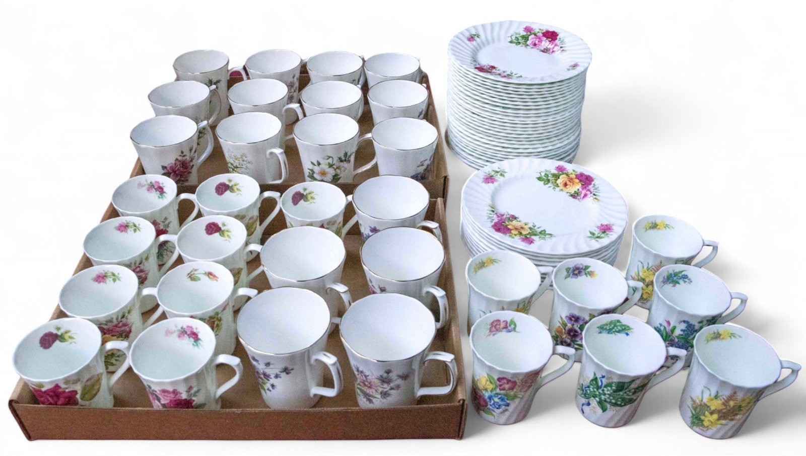 71 Pc English Bone China Dinnerware - Duchess, Etc: First, there are 35 pieces by David Michael China: 28 plates (7 3/4"), and 7 tea cups (3 1/2"). Next, the lot includes 19 pieces by Royal Victorian: 10 plates (8"), and 9 tea cups (3 1/2"). Finally, t