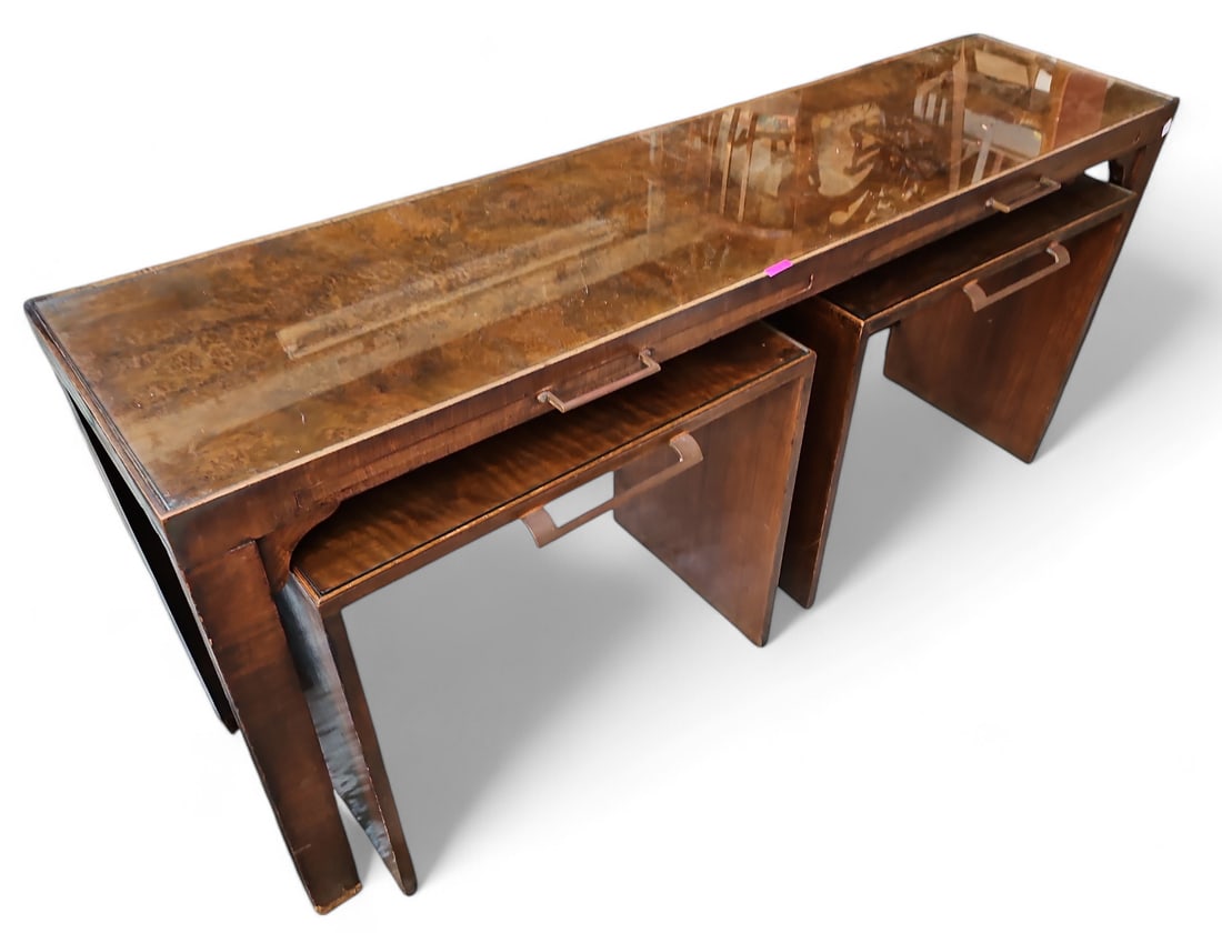 Burled Glass Top Console & Side Tables.: The console table has two pull-out surfaces with brass pulls. The two side tables fit neatly below the console table and have brass handles. The legs of the console table are missing veneer near the b