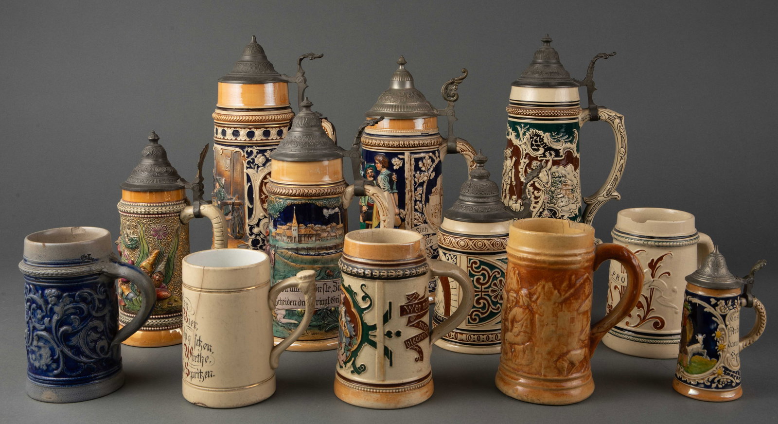Lot of 12 Assorted Beer Steins. (1 of 17)