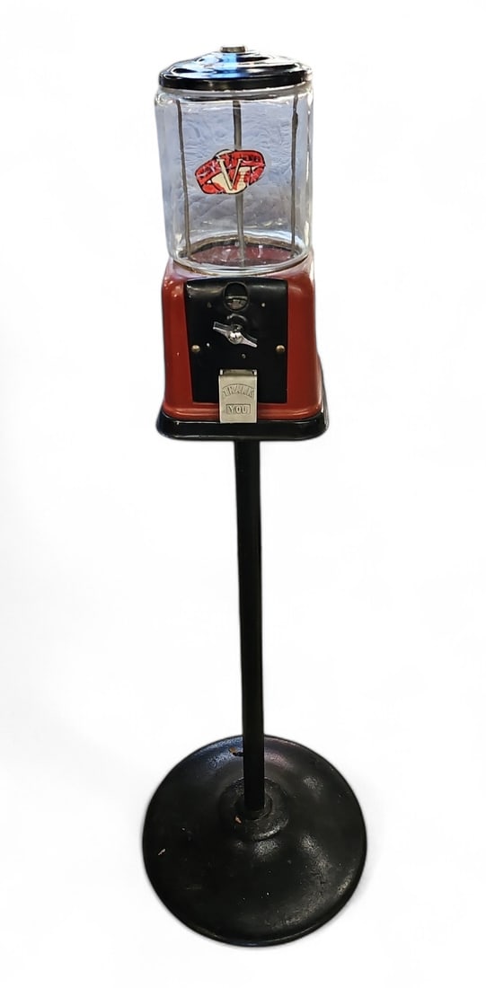 Vintage Gumball Machine - Victor Vending Corp.: This vintage metal and glass gumball machine is made by Victor Vending Corporation, Chicago, IL. No key is included. There are some gumballs inside, but they look pretty over-ripe (old)! The piece is