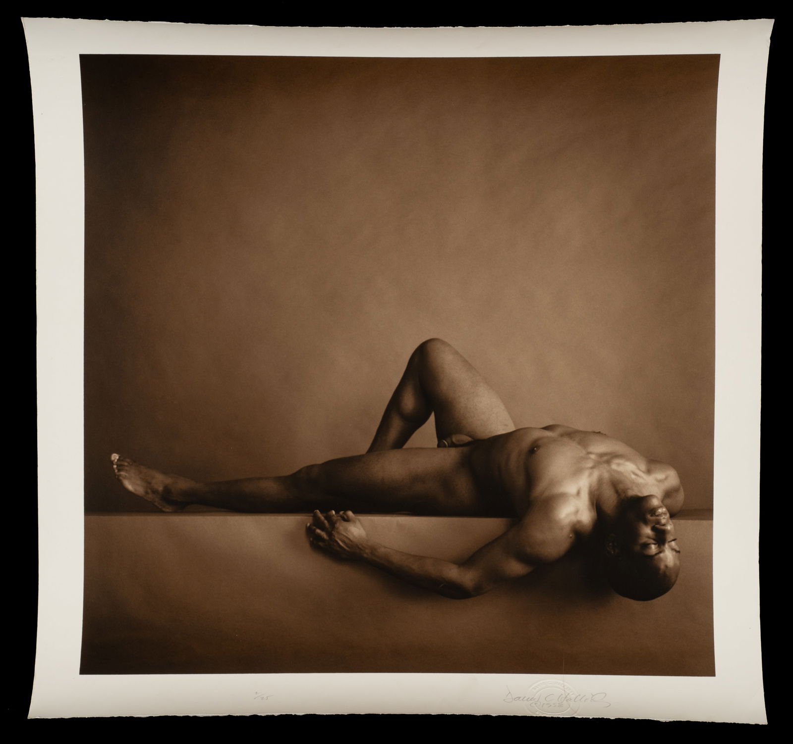 Reclining Nude Photograph by David Halliday.: Artist(s): David Halliday (American, b. 1958) Medium: Toned silver gelatin print. Signature(s): Pencil signed, "David C Halliday", numbered (2/25), and bears a Halliday copyright embossment in its low