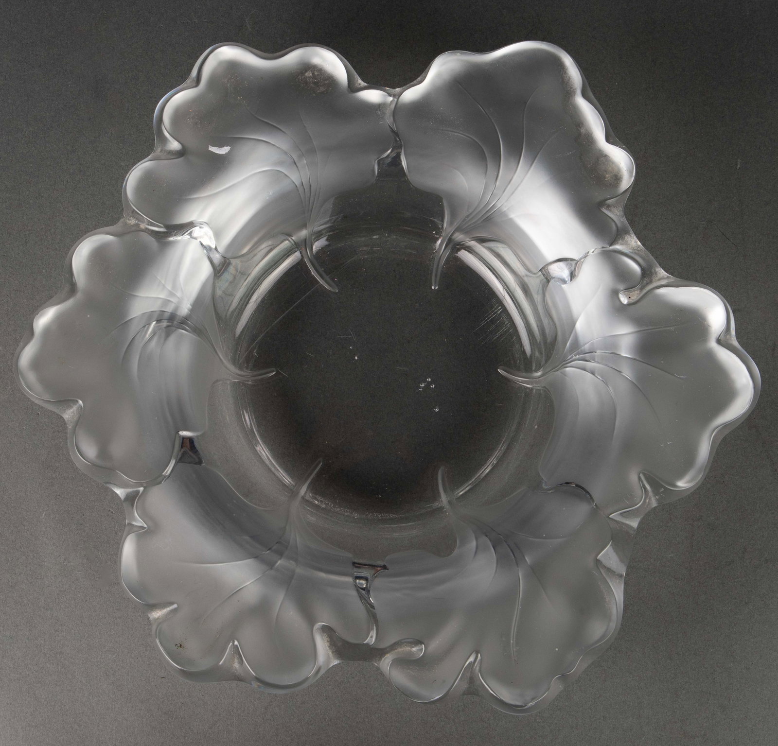 Lalique Crystal Capucines Nasturtium Bowl.: There is some dust in the crevices, but overall the bowl looks to be in nice condition. It measures 12 1/4" across and 2 3/4" tall. In-house shipping is available. Please see our website regarding in-