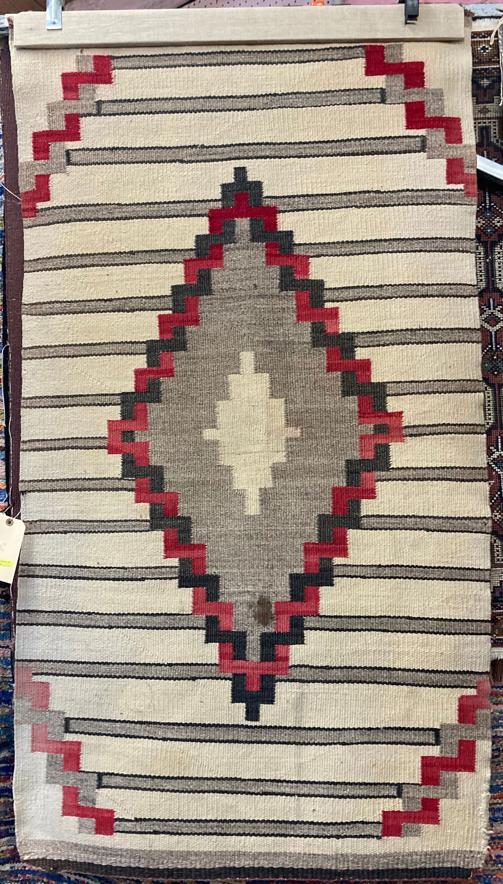 2' 10" x 5' 3" Tan, Brown & Red Navajo Rug. (1 of 3)