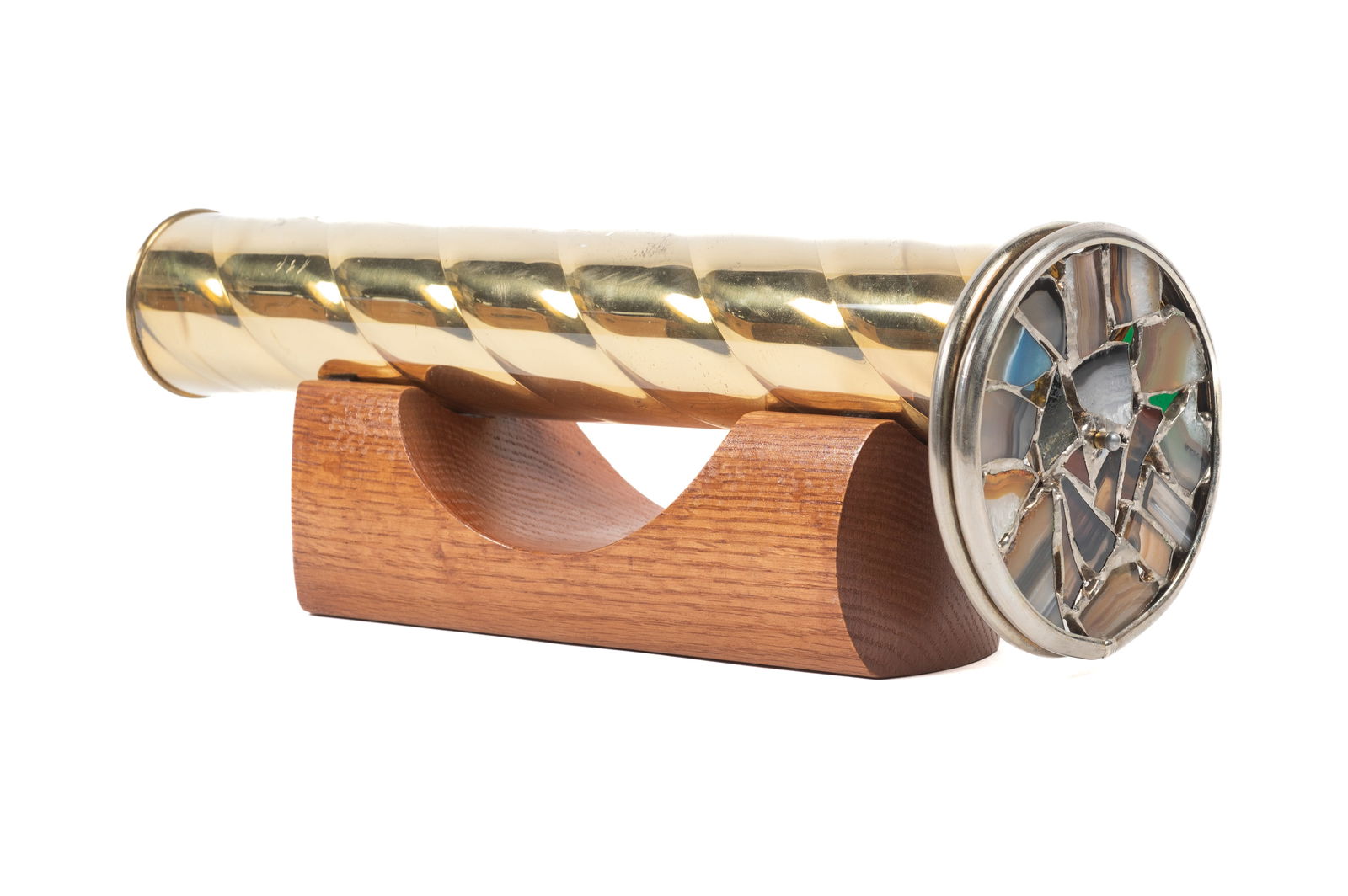 Chesnick-Koch Kaleidoscope w/ Wood Stand.: It Appears to be in Nice working condition. It has two wheels with glass and stone discs. The brass body has some Scratches. The Kaleidoscope measures 12" long. In-house shipping is available. Please