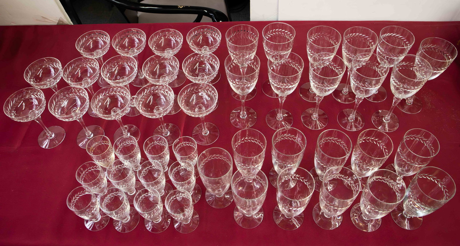 Large Lot of Cut Glass Stemware.: The lot includes 48 pieces in total. There are 14 coupes, 11 wine goblets, 11 beer glasses, and 12 sherry glasses. The smallest glasses in the lot measure 4 3/8" tall, and 2 1/8" in top diameter. The 