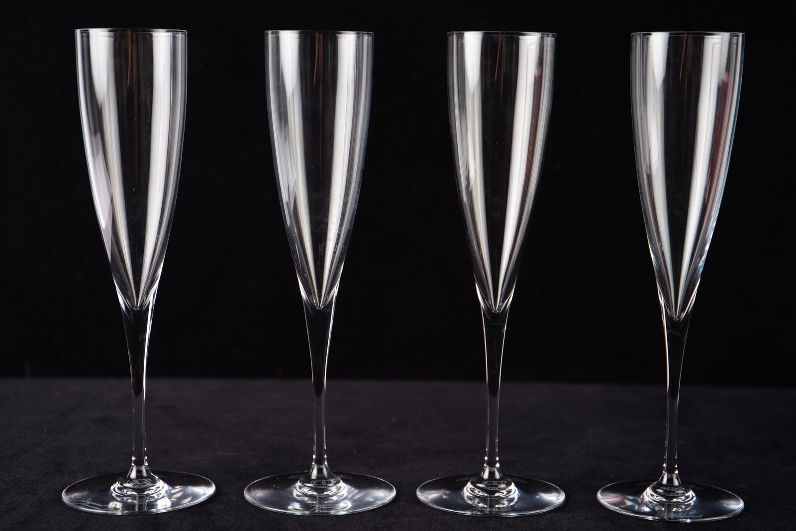 Set of 4 Baccarat Crystal Champagne Flutes.: The original boxes are included. Each flute measures 9 1/4" tall, and looks to be in good condition. In-house shipping is available. Please see our website regarding in-house shipping procedures.