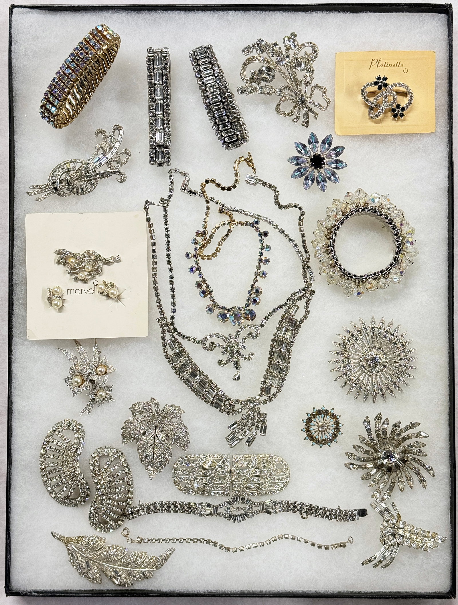 Lot of Rhinestone Costume Jewelry - Corocraft, Etc: This lot consists of 24 pieces of vintage mainly rhinestone jewelry. The brands included are Ora, Corocraft, Albion, B. David, Bogoff Pat. Pending, Ledo, Parco, Karu Arke Inc., and Saltarelli. The lot