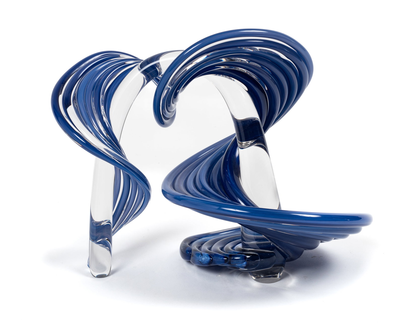 Thomas Buechner III Signed Swirl Glass Sculpture.: It is signed and dated 1992. Depending on the lighting, the color can appear blue or purple. It looks to be in very nice cosmetic condition. The dimensions are 13 1/4" x 7 3/4" x 9 1/2". In-house ship