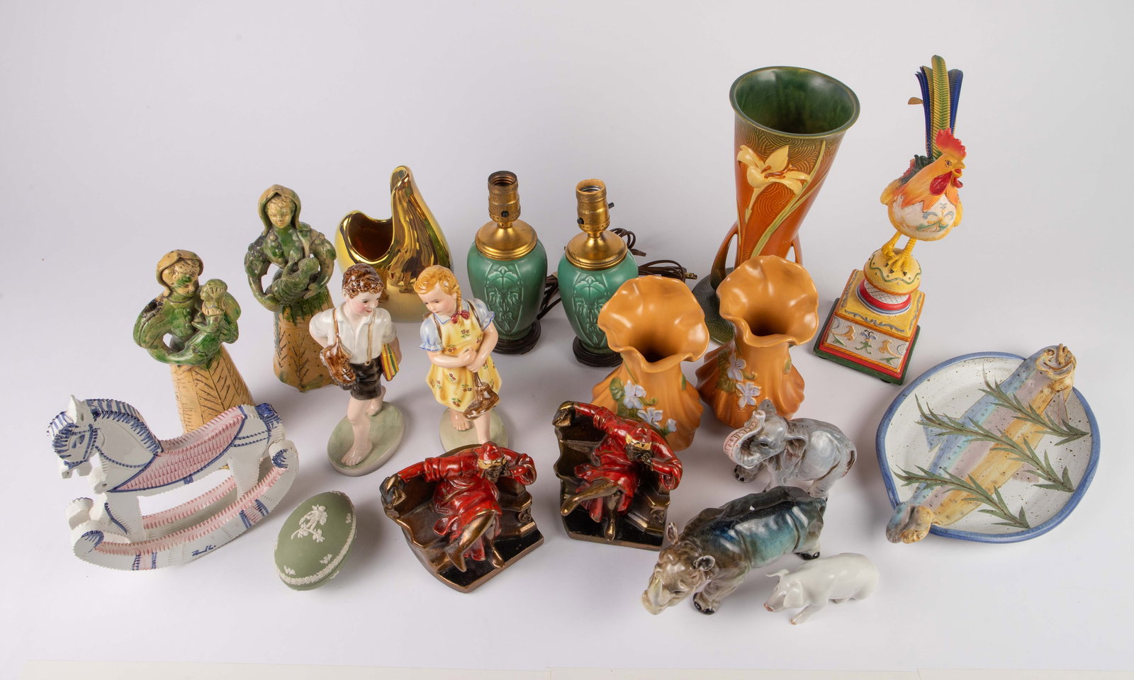 Lot of Assorted Figurines, Pottery, Bookends. (1 of 15)