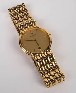 Raymond Weil Geneve Fidelio 18K Plated Men's Watch: This vintage date watch is 18K gold electroplated and 10 Meters water resistant. The case measures 31mm in diameter. It ticks. There are some scratches on the piece, and there appears to be a green st