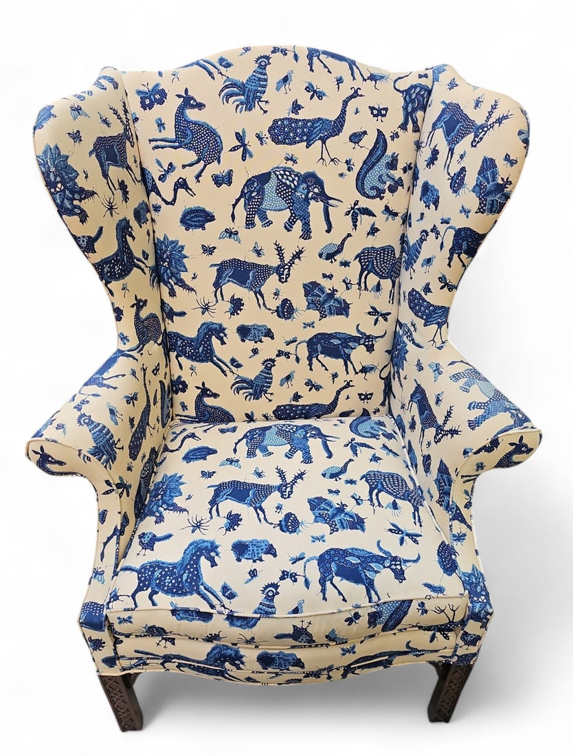 Wing Back Chair w/ Lee Jofa Java Jungle Upholstery: This vintage chair features linen upholstery by Lee Jofa in the Java Jungle design, in a now discontinued color combination of cream and blue. The chair measures 47" tall, 36" wide, and 25 1/2" deep.