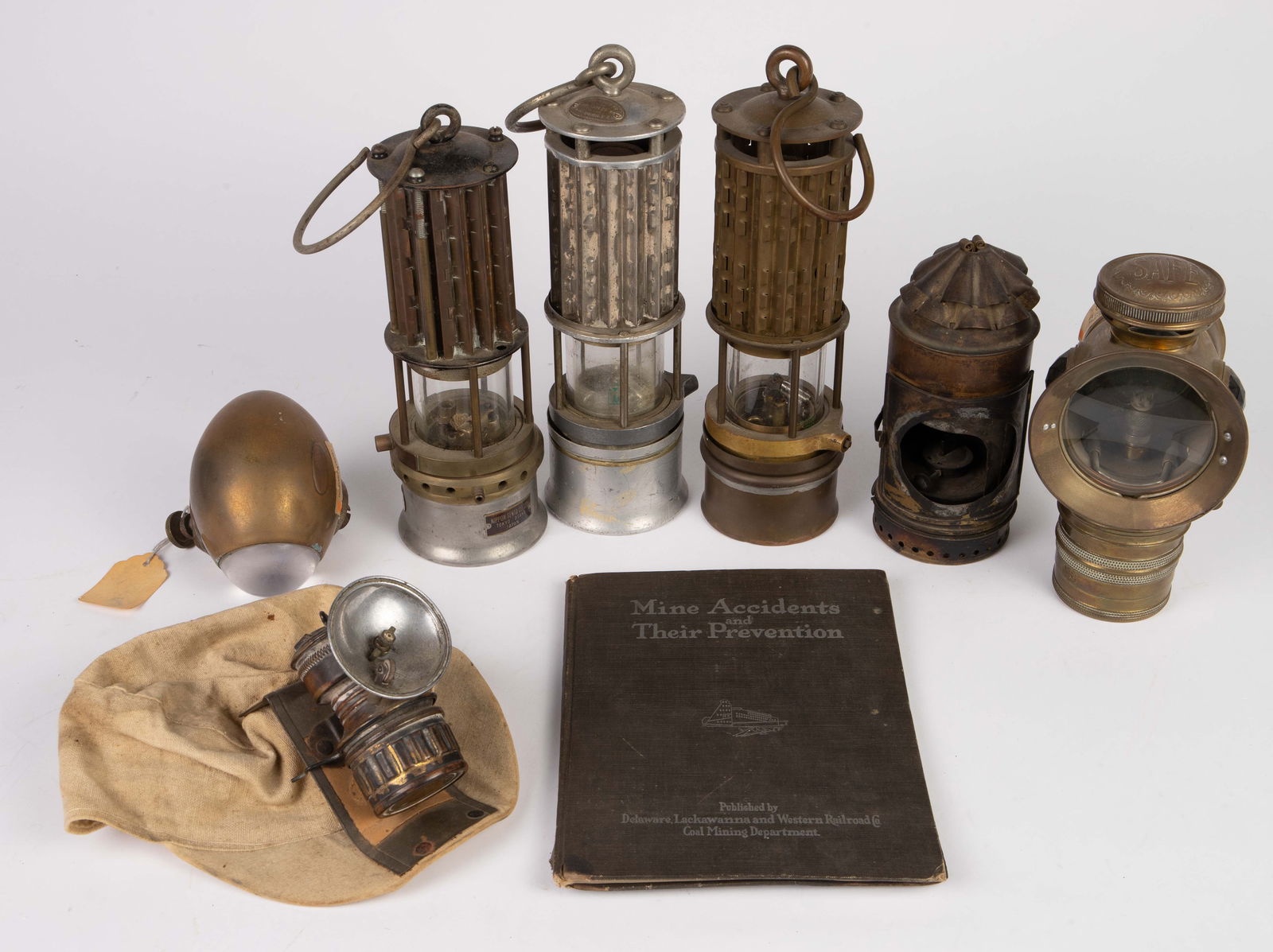 Lot: Antique Coal Mining Items - Lamps, Hat, Book. (1 of 17)