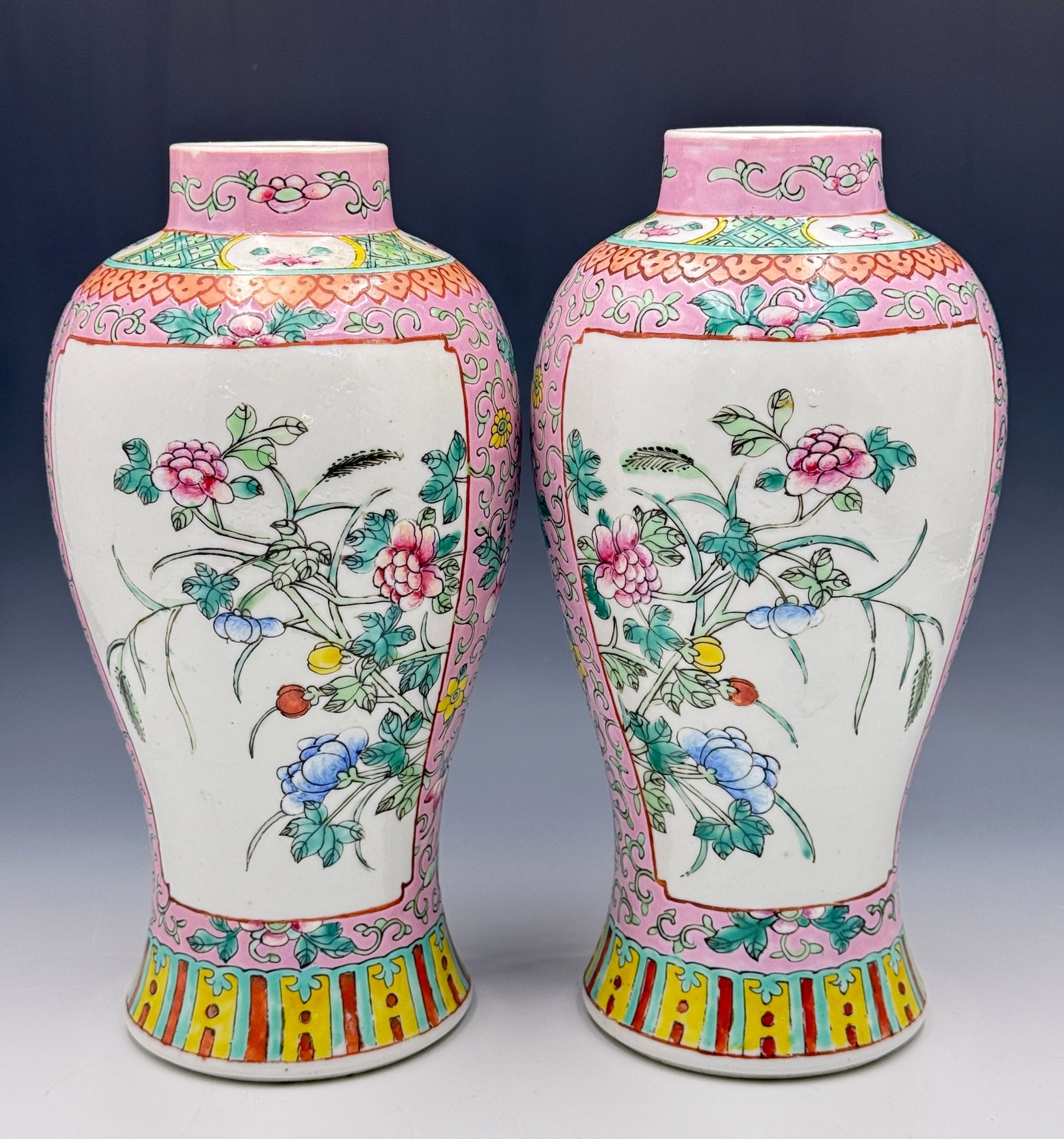 Pair of Vintage Chinese Famille Rose Urns, No Lids: They are marked "China" on the undersides. The urns look to be in good overall condition, with some minor wear to use. They measure 10" tall. In-house shipping is available. Please see our website reg