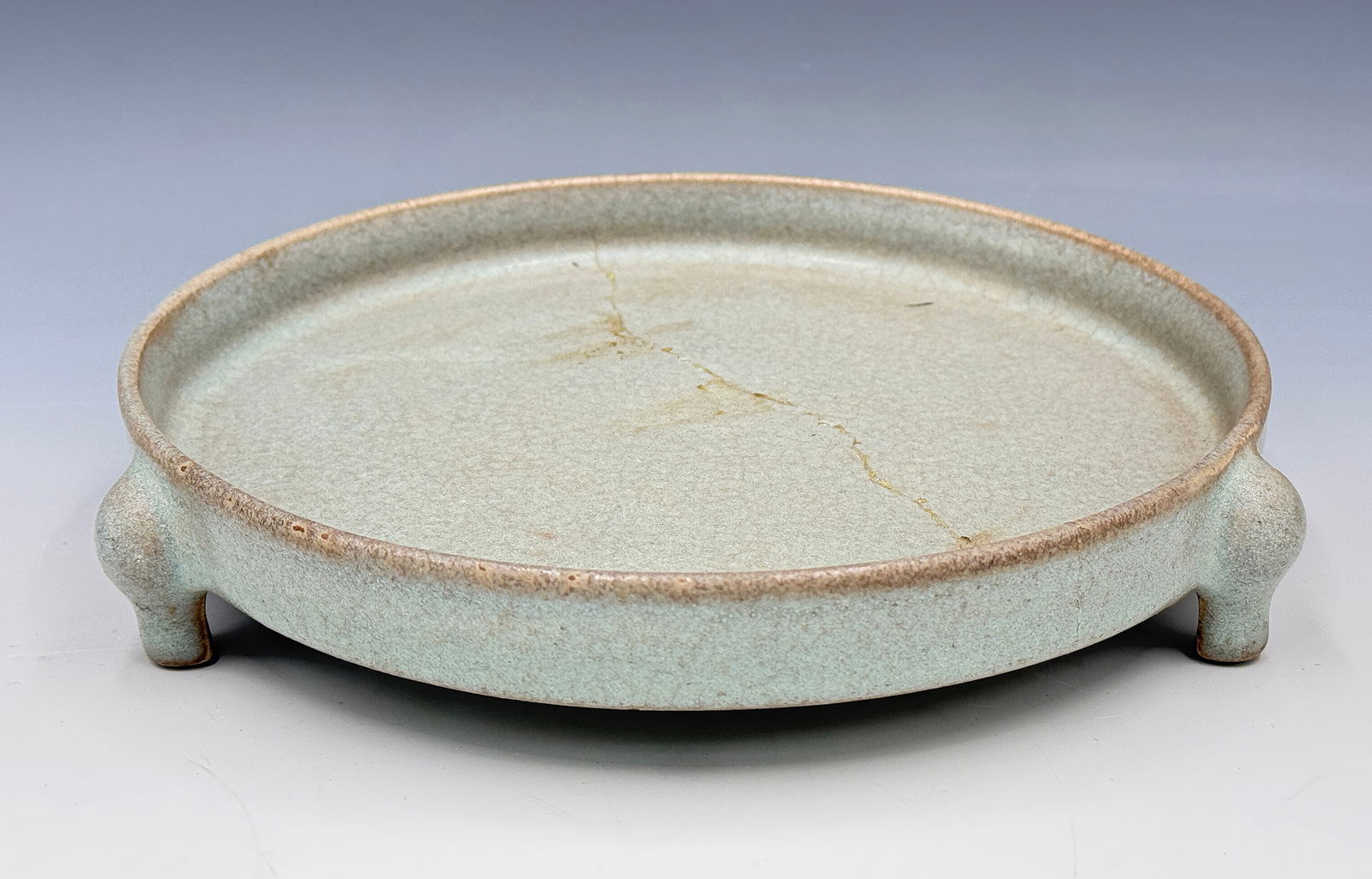 Chinese Porcelain Brush Washer, AS IS.: The entire length of the washer has been cracked and repaired. One of its legs has also been repaired. It measures 1 1/2" tall and the basin measures 7 1/2" in diameter. In-house shipping is available