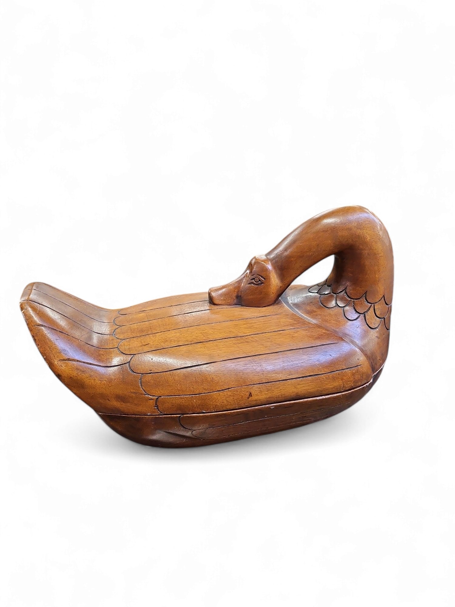Arthur Court Wood Duck Box.: This light wood duck has a varnished coating. The top lifts off, and there is a storage area in the lower half. There are some minor scratches present. It measures 21" wide, 10" deep, and 14" tall. Th