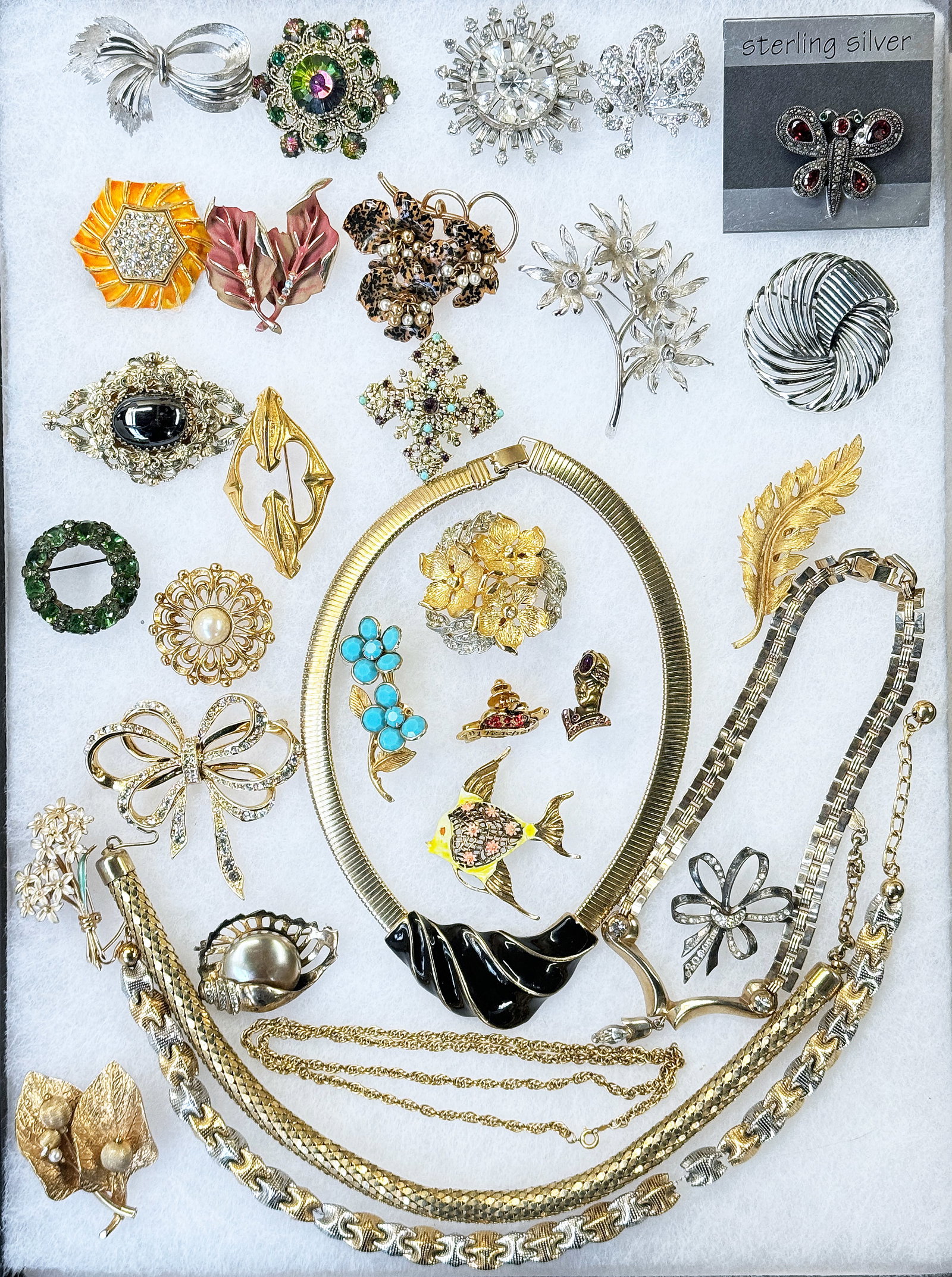 Lot of Costume Jewelry - Lisner, Warner, Etc.: This lot contains over 30 pieces of jewelry, one sterling. Some of the brands included are Whiting and Davis, Napier, Pastelli, Marboux, Kramer, Danbe, Weiss, Warner, Richelieu, Sphinx, Art, Lisner, C