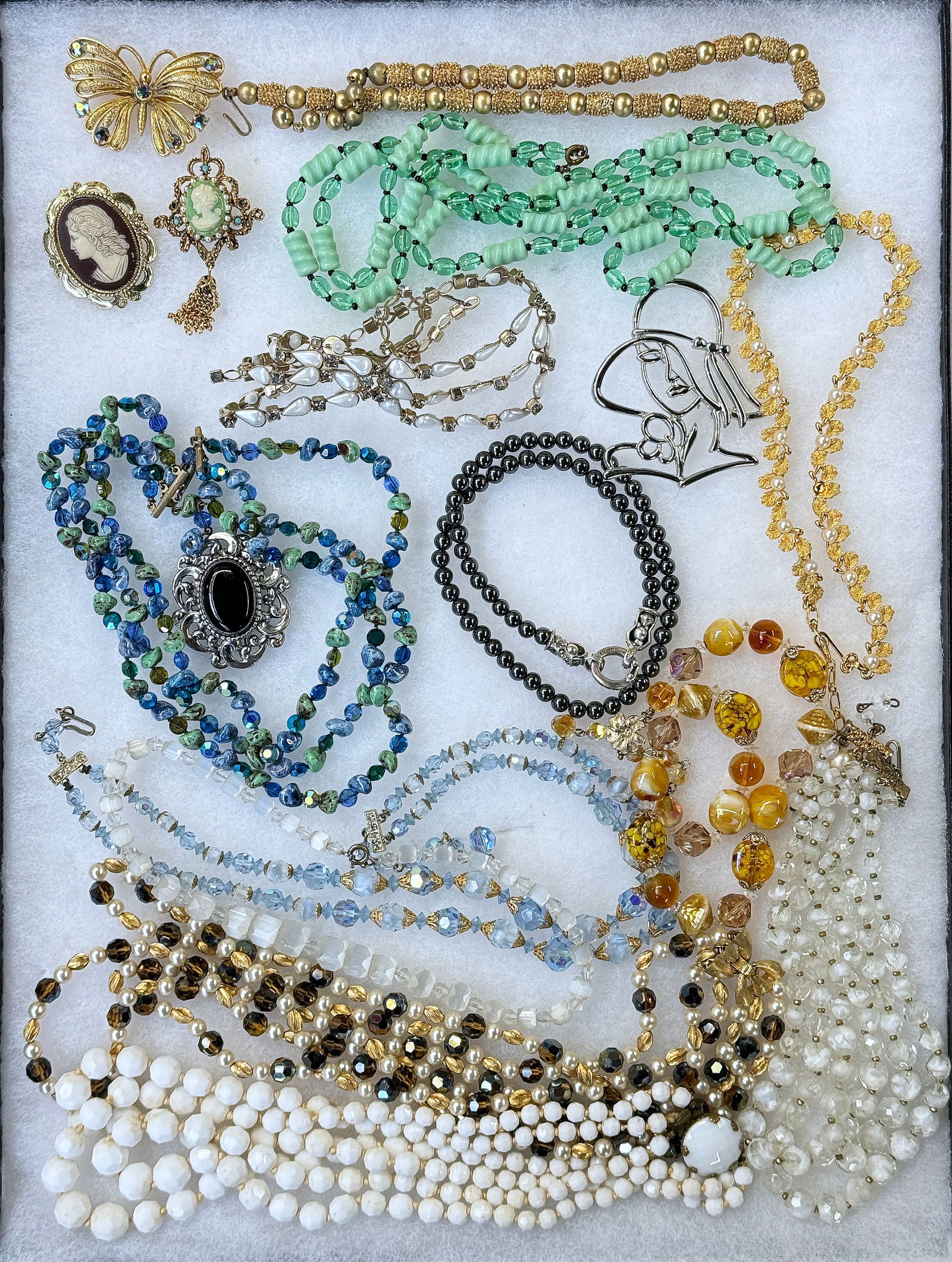 Vintage Costume Jewelry - Hattie Carnegie, J.J.: The lot includes 17 pieces of vintage necklaces and brooches. Hattie Carnegie, J.J., Laguna, Danecraft, Florenza, Lisner, Vendome, Trifari, and more. There is a few pieces with sterling - a brooch, an