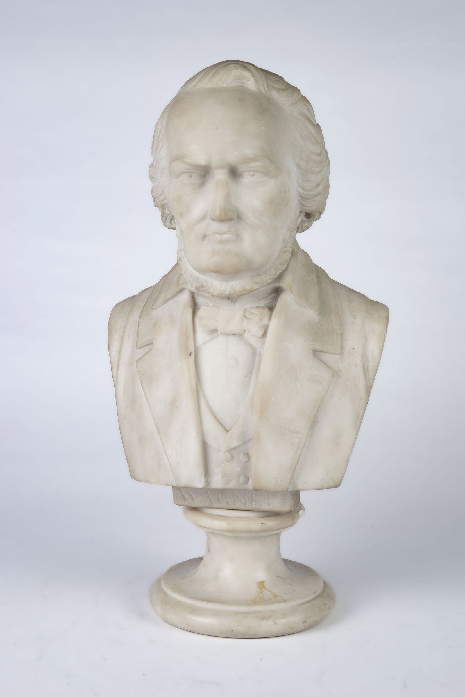Alabaster Bust of Wilhelm Richard Wagner: This carved bust is signed on the back, though it is a little difficult to make out the signature. The bust is attached to a marble stand, and can be turned so that Wagner is facing different parts of