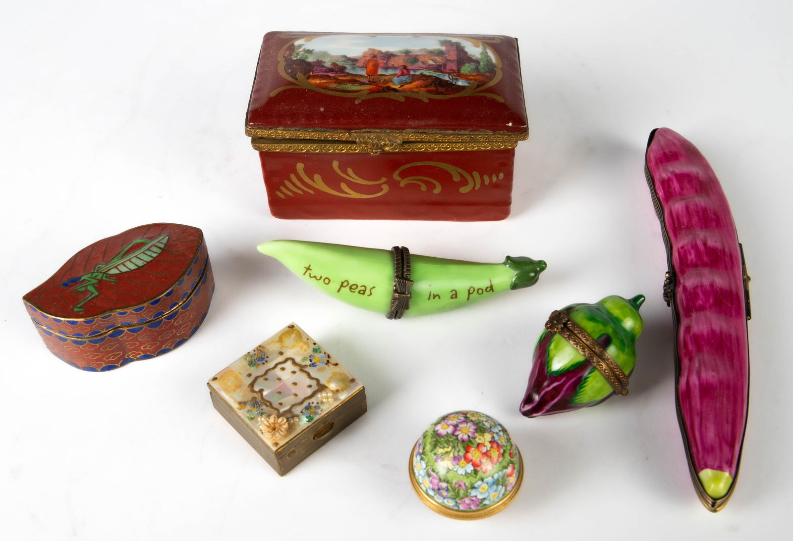 Lot of Pillboxes, including Limoges.: The Limoges hand painted pillboxes resemble a purple rosebud and a pod of white beans. There is also a "Two peas in a Pod" pillbox, made by Midwest of Cannon Falls. The other pillboxes are a cloisonne