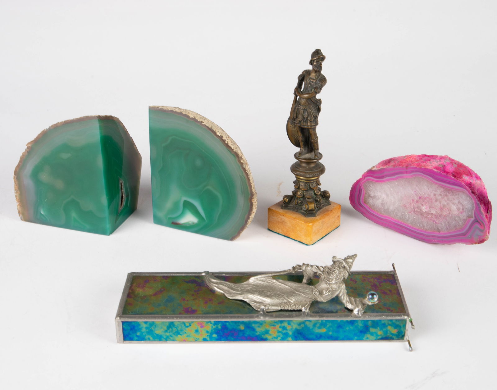 Lot: Wizard Kaleidoscope, Agate Bookends, etc.: This lot includes a soldier figure, an iridescent kaleidoscope with a pewter wizard, a pair of bookends (possibly green agate), and a bright pink agate geode paperweight. The lot looks to be in good c
