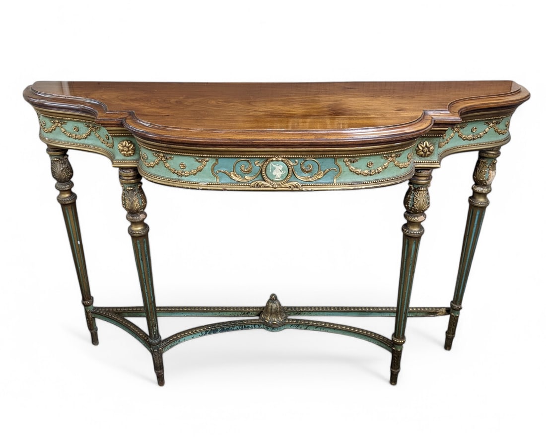 Ornate French Style Console Table.: This console table has a walnut top, with gilt decorations on the apron, legs, and stretcher. Many of these decorations are damaged, and one of the stretchers needs to be reattached. The piece measure
