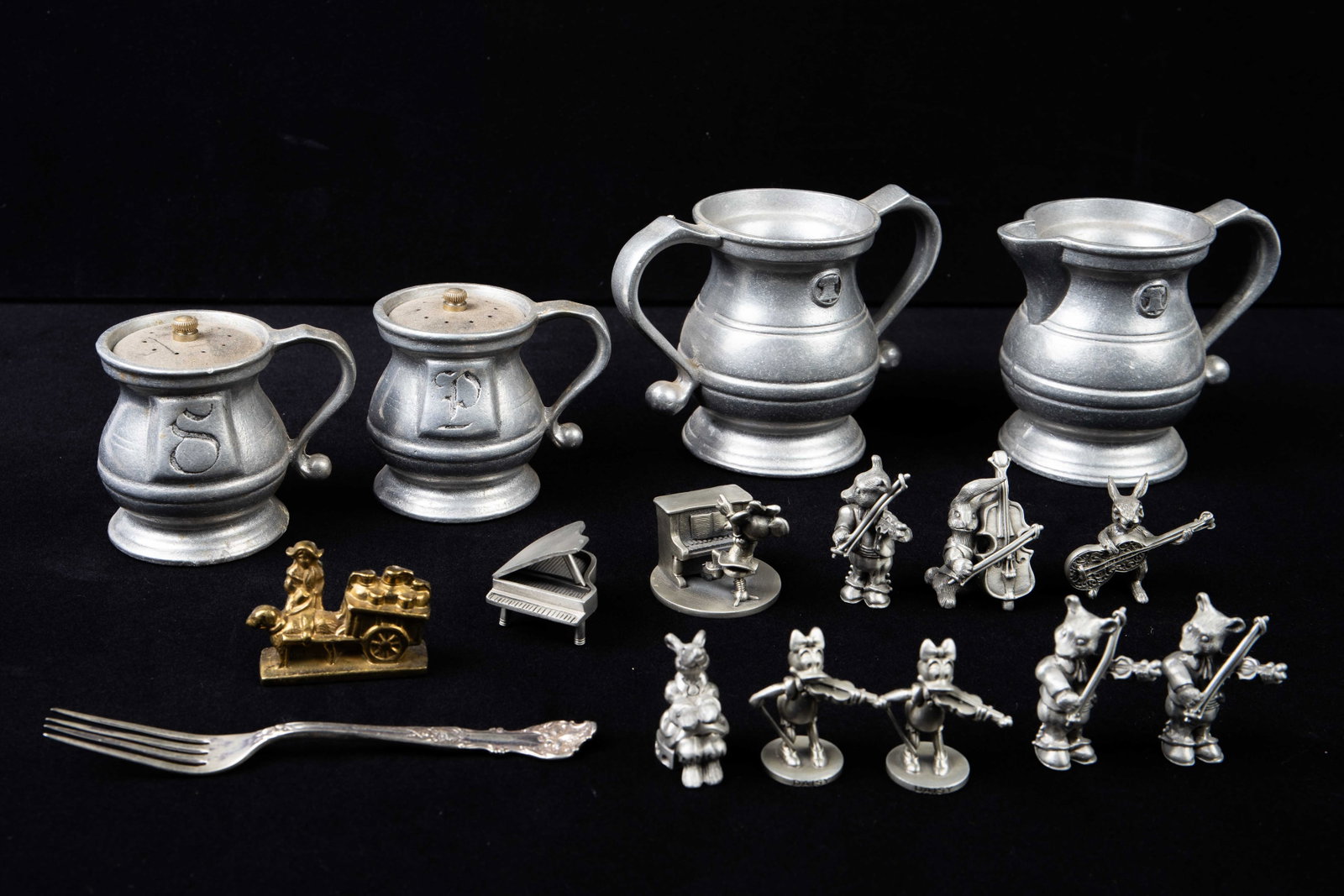Lot of Pewter Items - Schmid Figures, Cups, Salt.: The lot consists of 15 items in total. There is a pair of 3" salt and pepper shakers, a 4" double handle cup marked BWP U.S.A., and a 4" jug. Next, there are 9 figurines by Schmid, mostly from the 197