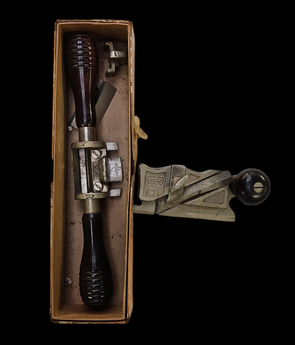 2 Antique Stanley Wood Planes, No. 67 & No. 99.: The lot consists of 2 Stanley wood planes. First, there is a Universal Spoke Shave plane No. 67 with a Stanley Rule & Level Co. box. The Stanley Works mark on the plane indicates a later date than the