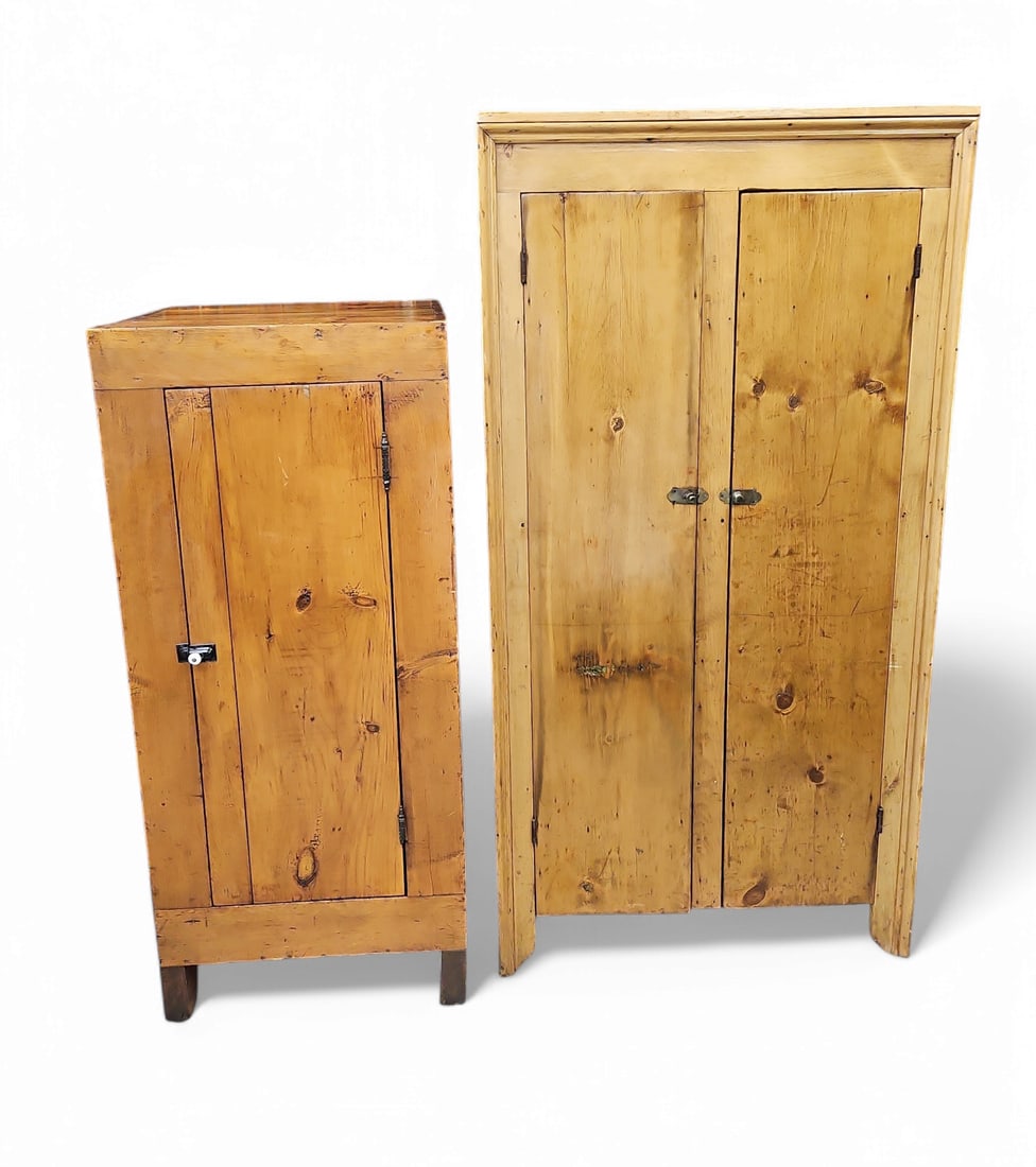 Lot of Two Rustic Primitive Pine Cabinets.: The first cabinet is smaller, and has a single door with two removable shelves, a lower storage compartment, metal & porcelain knobs, and metal casters. The second cabinet is a corner cabinet with two